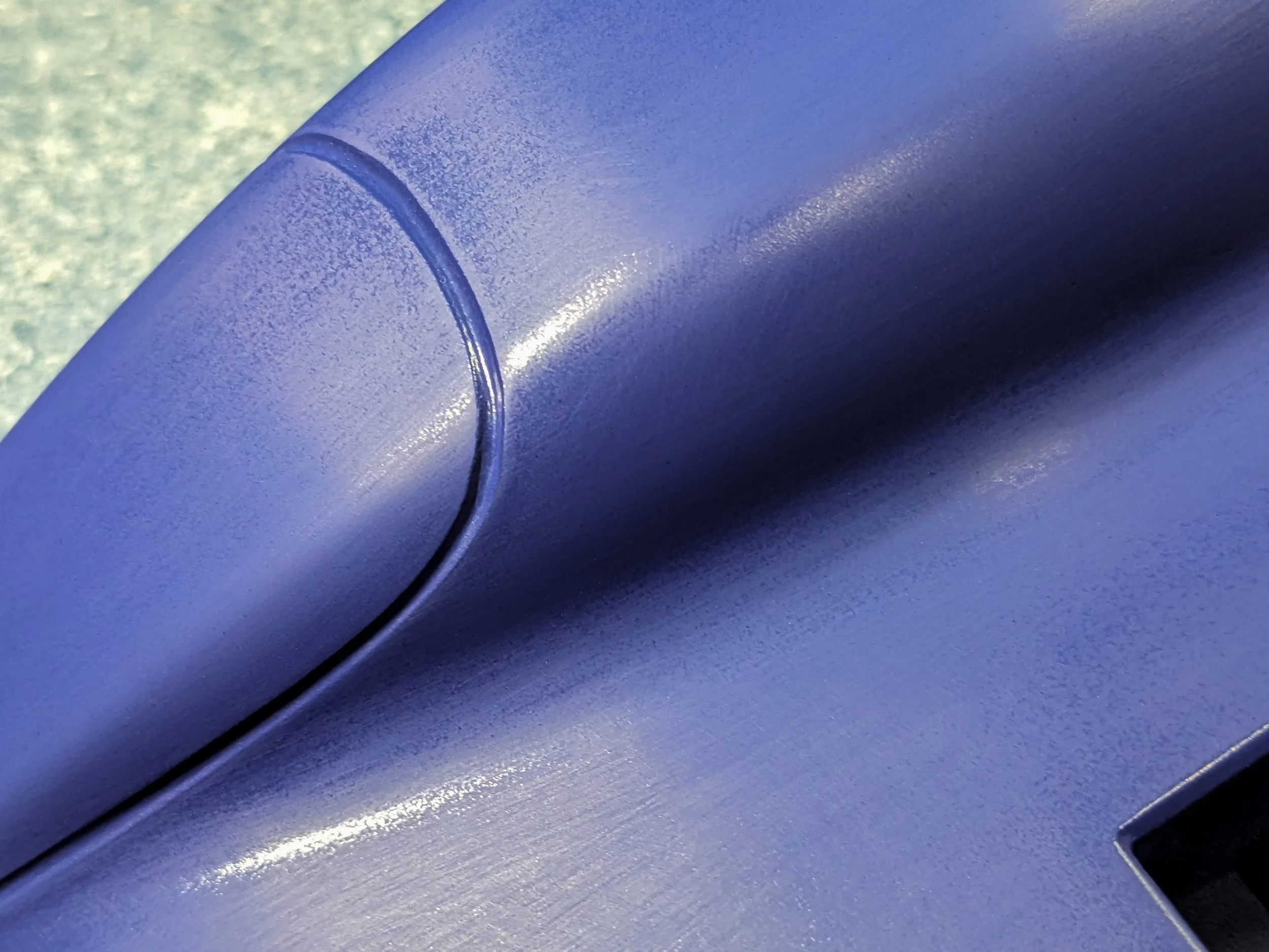 close up of Co-Hog Lola T70 headlight outline groove