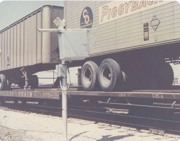 Can you find the barcode on this train? Kartrak, invented by David Collins in 1959 was a colorful barcode system used to track railway cars including the Boston and Maine railway that ran through Somerville.  Peter Collins (son of the father of Barco