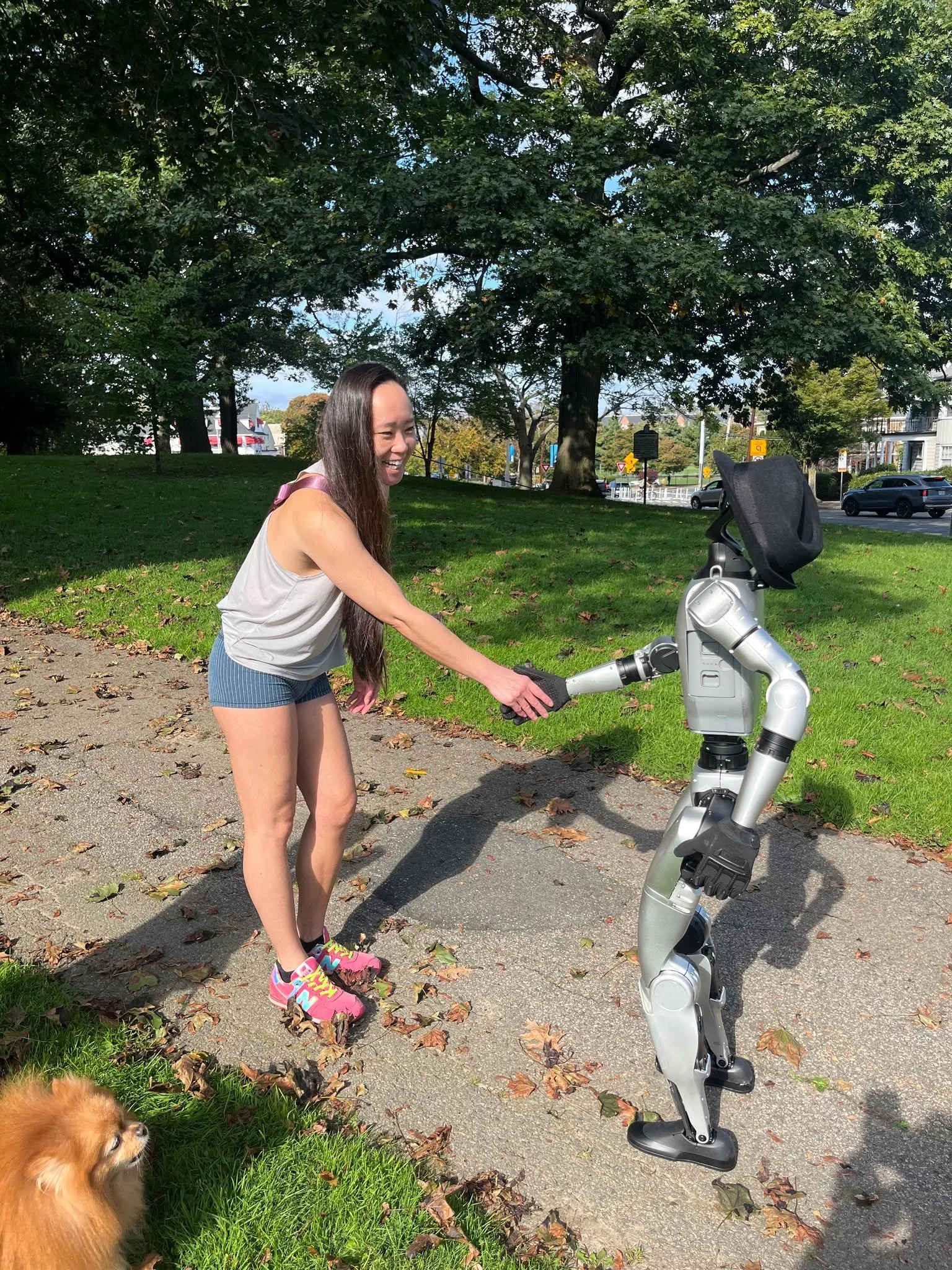 The robot got up and started greeting people in the park! I was eavesdropping as best I could and heard him say his name was Isaac Asimov! He's dead I thought, but I supposed with his obsession with robots, he could have created this robot version of