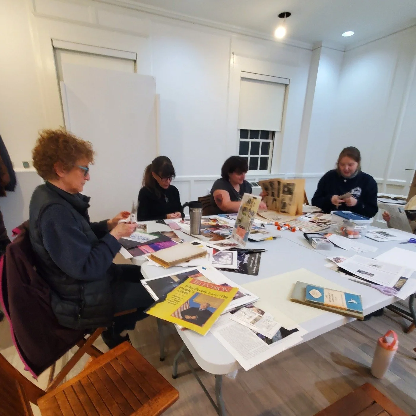 Thank you to everyone who joined us for Collage from the Collection! It was such a joy to see participants dig into images from the museums's past, reimagining historic photographs, books, and ephemera into brand-new works of art.

The room was fille