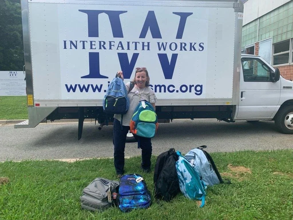 Volunteer at the Interfaith Works Clothing Center