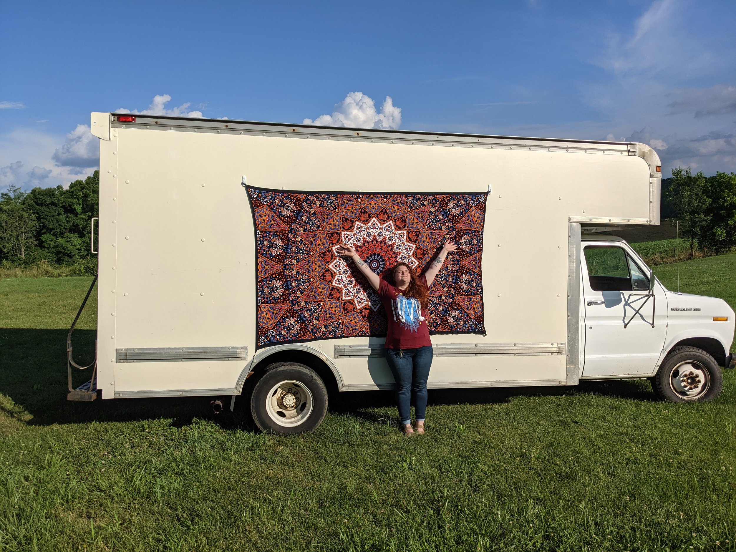 The first truck - we remember her fondly, but we're happy to be working out of a bigger, taller, and newer model Isuzu NPR.