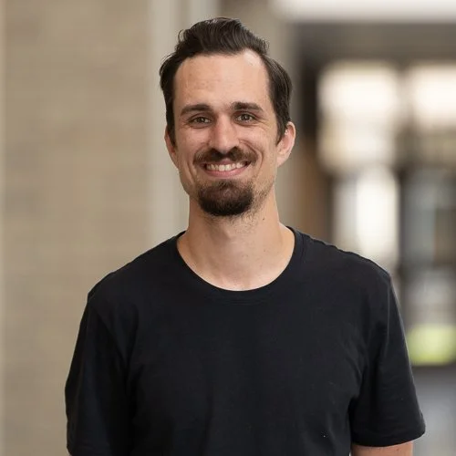 Smiling man in a black t-shirt
