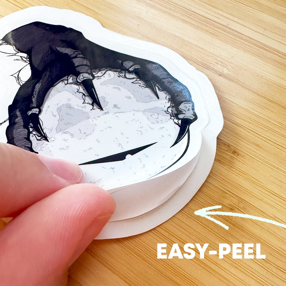 A sticker of an eyeball pen and ink drawing that is partially peeled from backing with words "Easy-Peel"