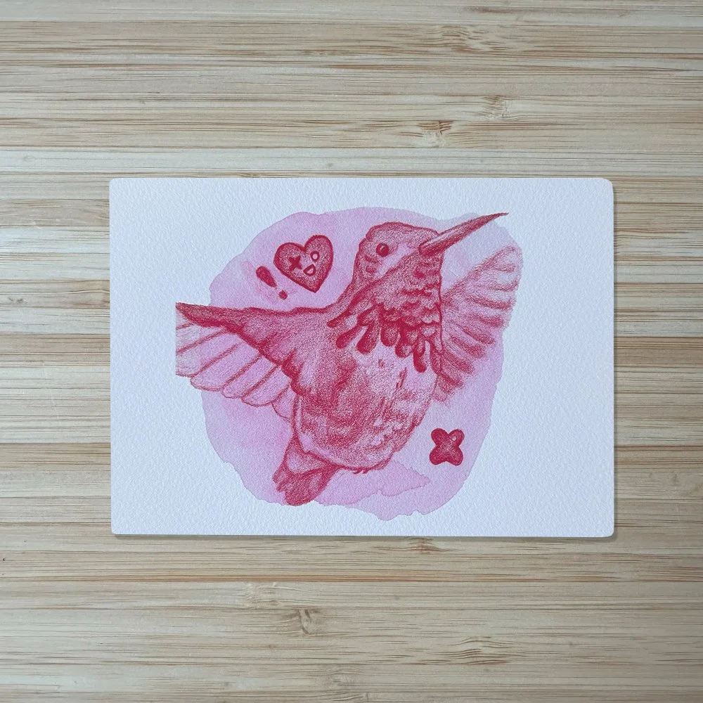 An art print of a hummingbird colored pencil drawing