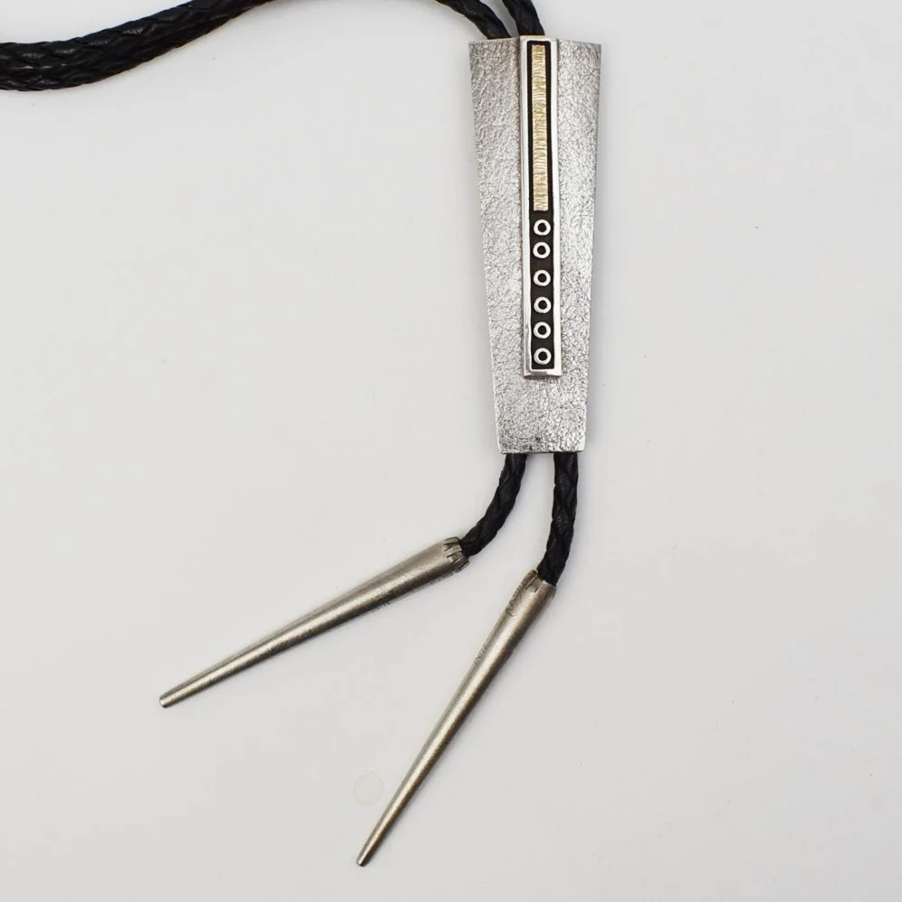 Myron Panteah (Zuni) Silver and 14k Gold Bolo