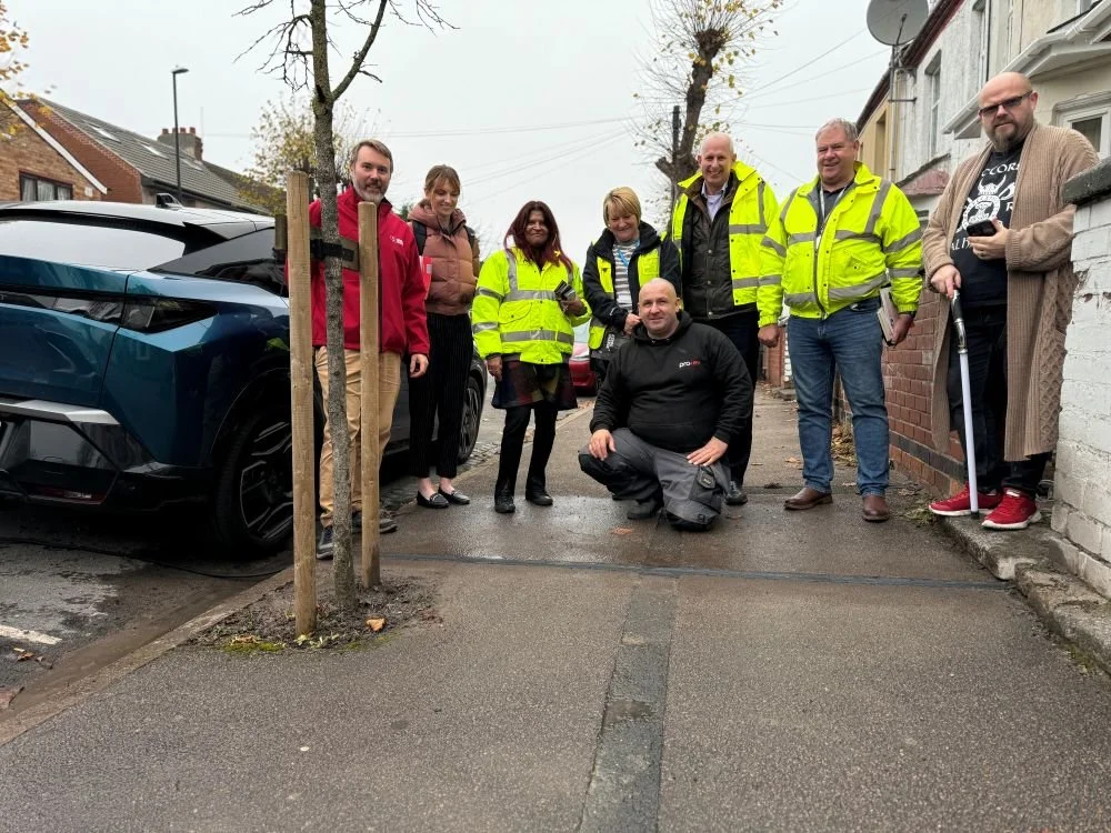 Kerbo Charge Team & Coventry resident pictured with newly installed Kerbo Charge Gully