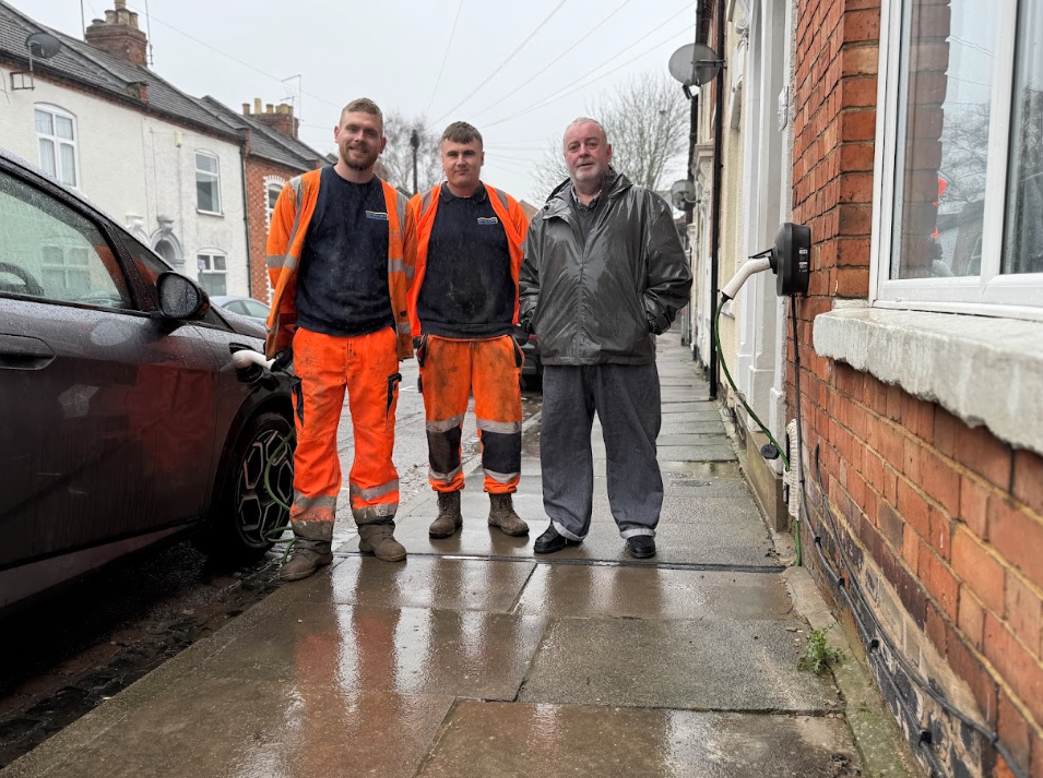 A happy resident with a couple of our contractors  💚