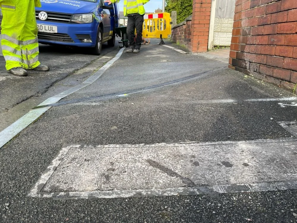 EV cable channel in pavament