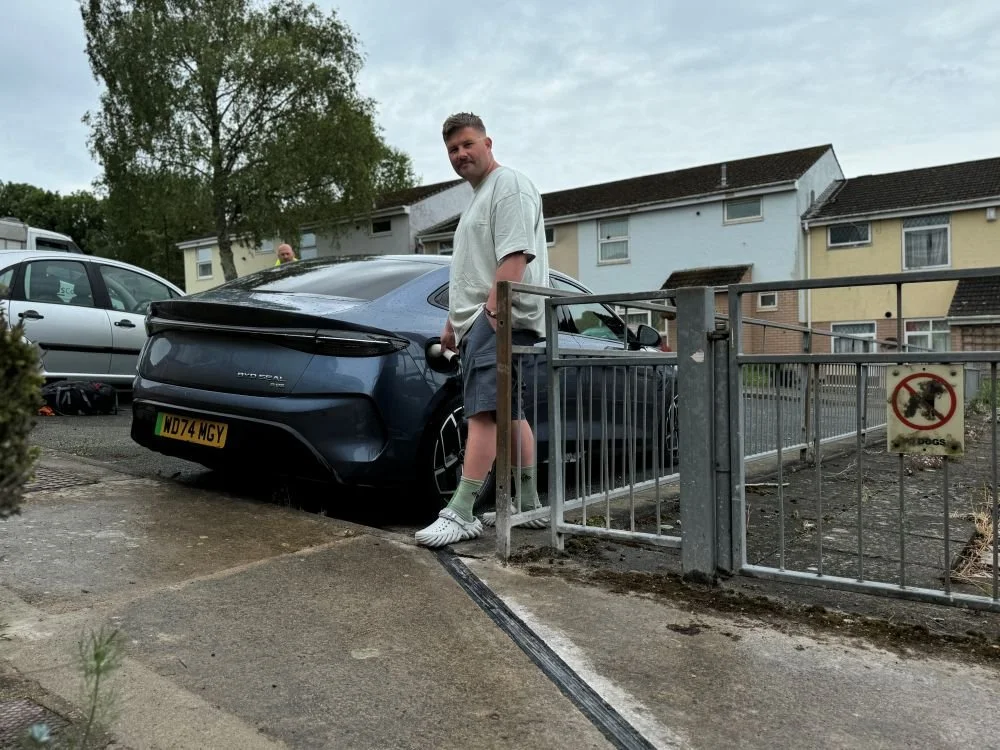 Kerbo Charge customer charging car using EV cable channel