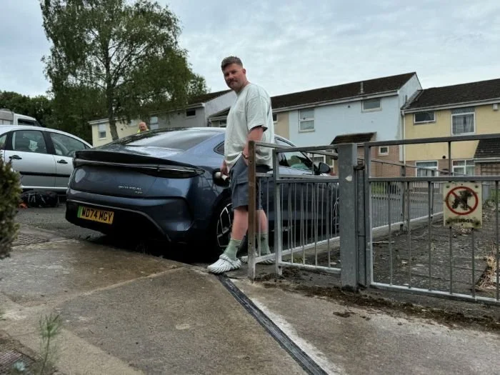 Kerbo Charge customer charging car using EV cable channel