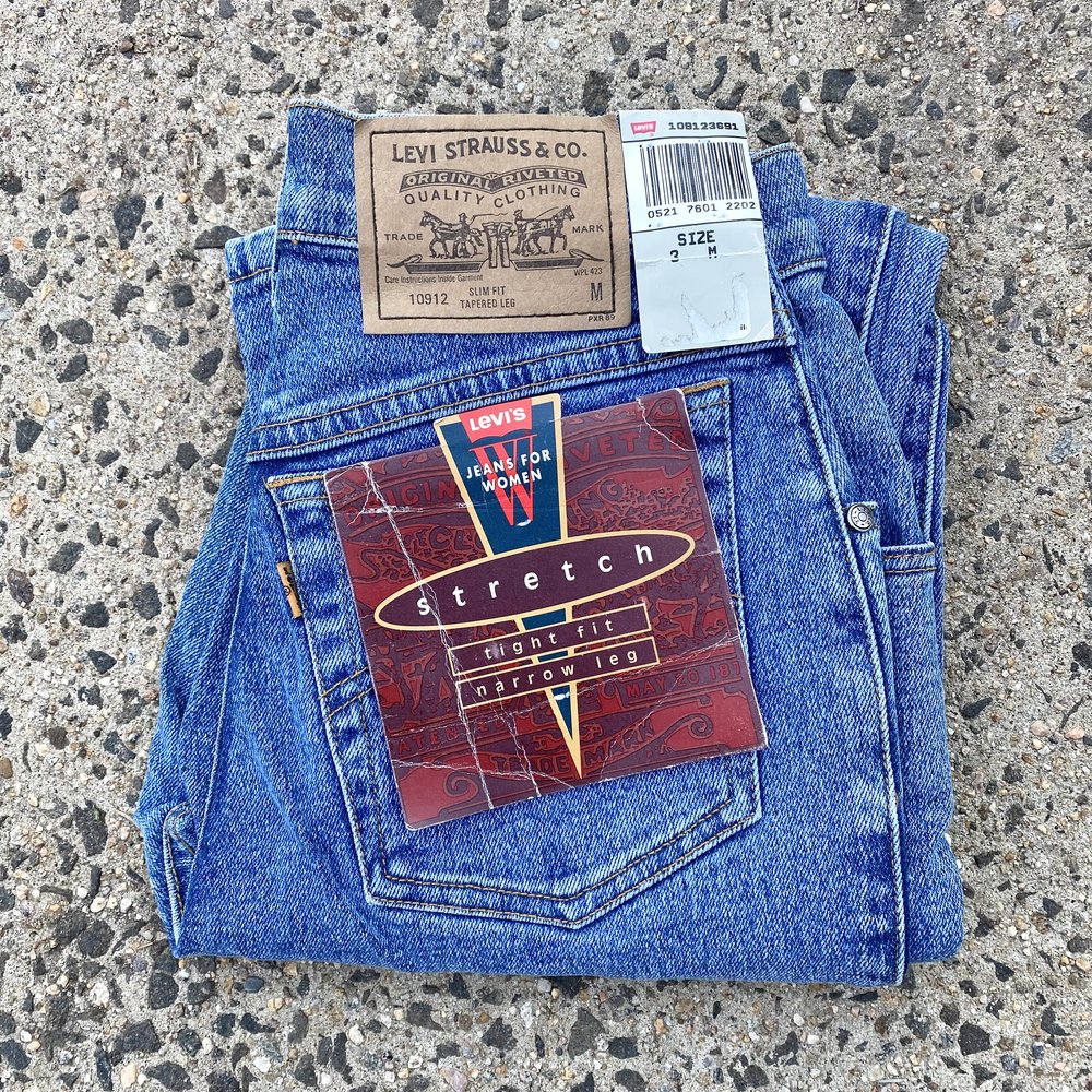 Vintage '90s DEADSTOCK NWT Levi's 912 Jeans / 23