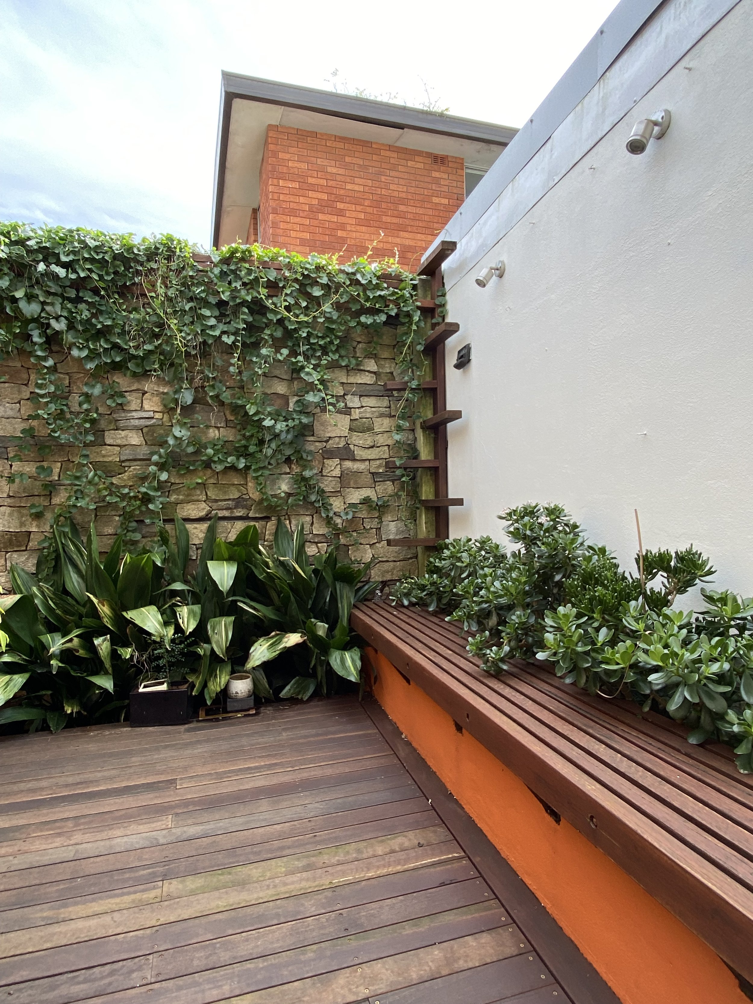 Outdoor garden with bench by The Walking Tradie.jpg