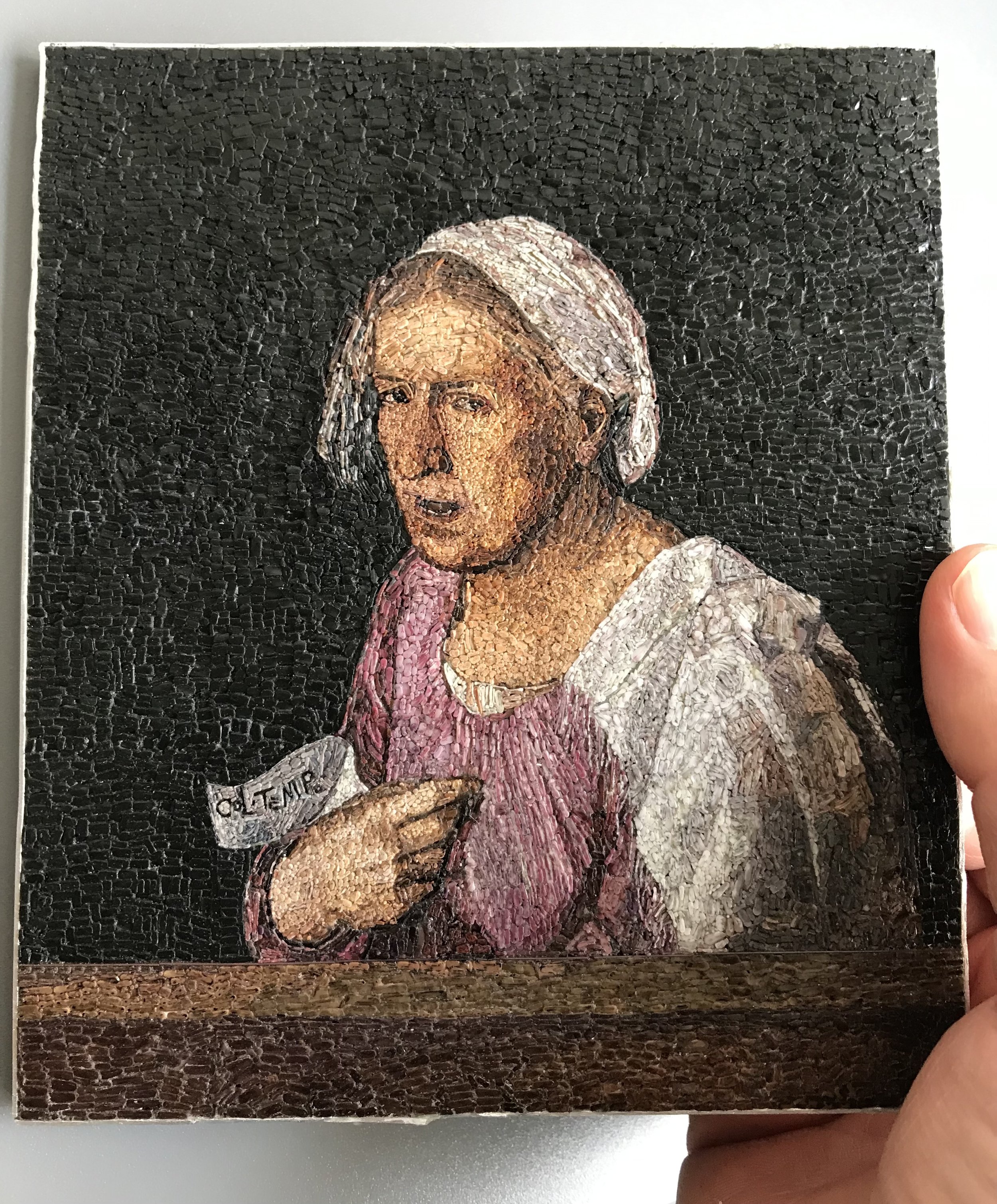 This micromosaic is the reproduction of the original Giorgione's painting, called "La vecchia".
Cm. 15,0 x 13,0     Inch 5,91 x 5,12