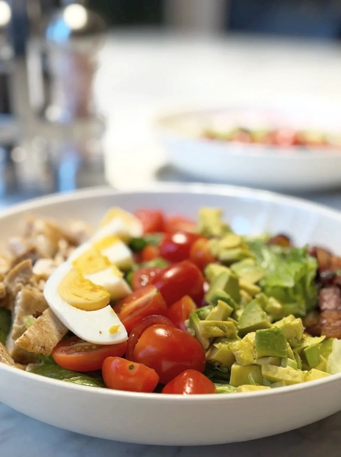 COBB blue cheese dressing, romaine, roast chicken breast, chopped egg, avocado, cherry tomato, bacon lardon