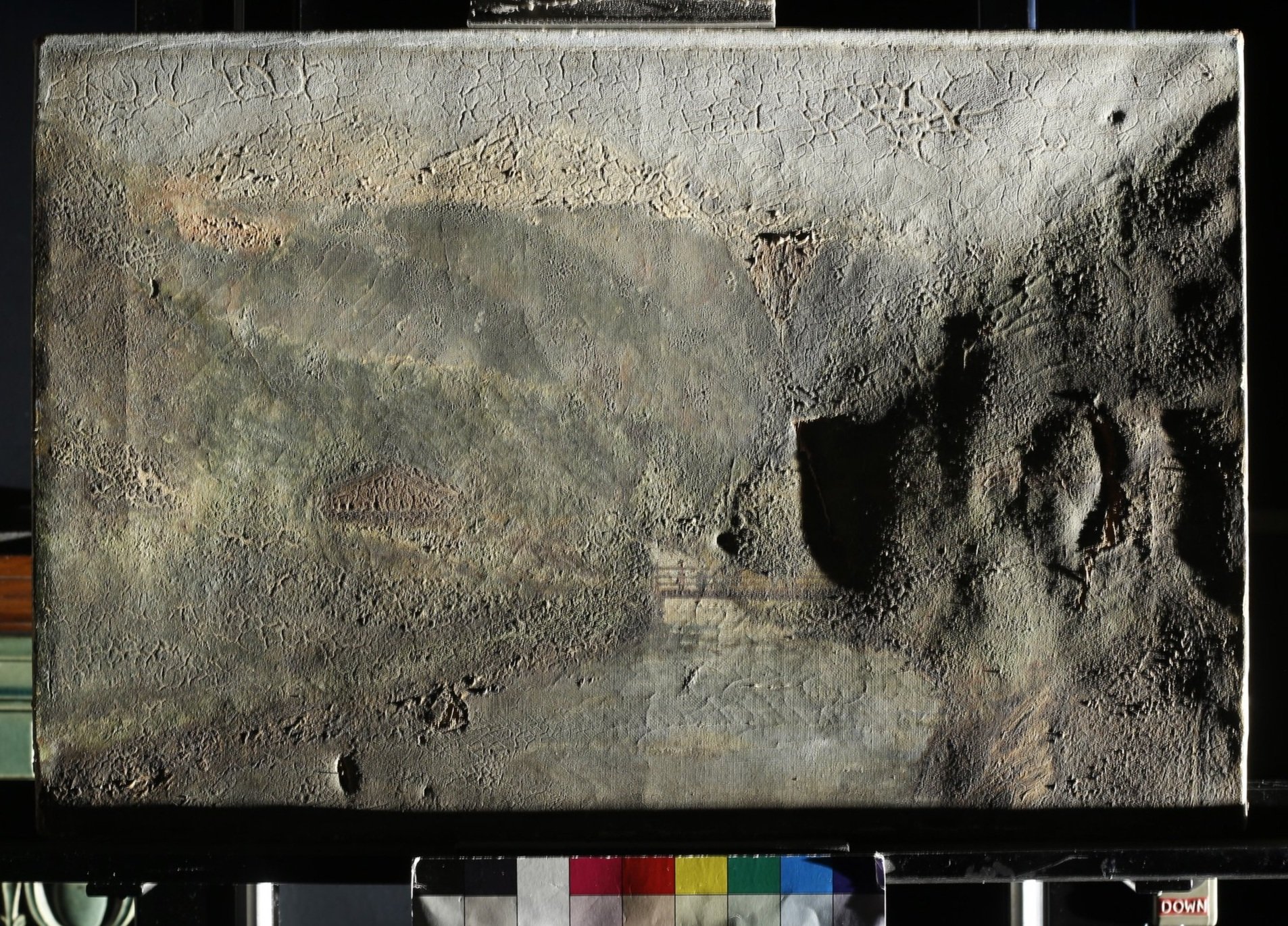 Full recto of 'Untitled Landscape' before treatment in raking light EV0.