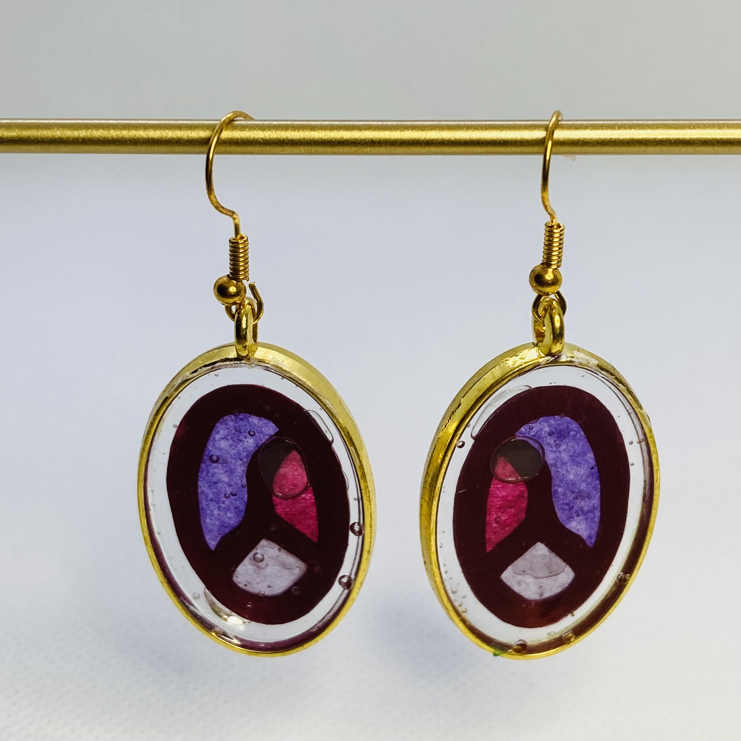 Oval Purple Gold Bar.jpeg
