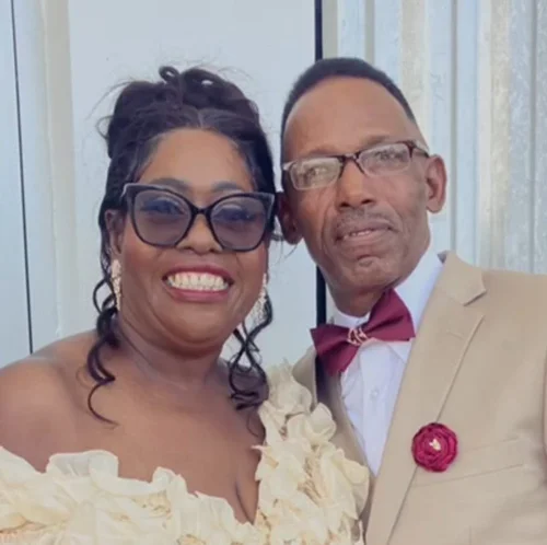 Married couple smiling after marriage restoration