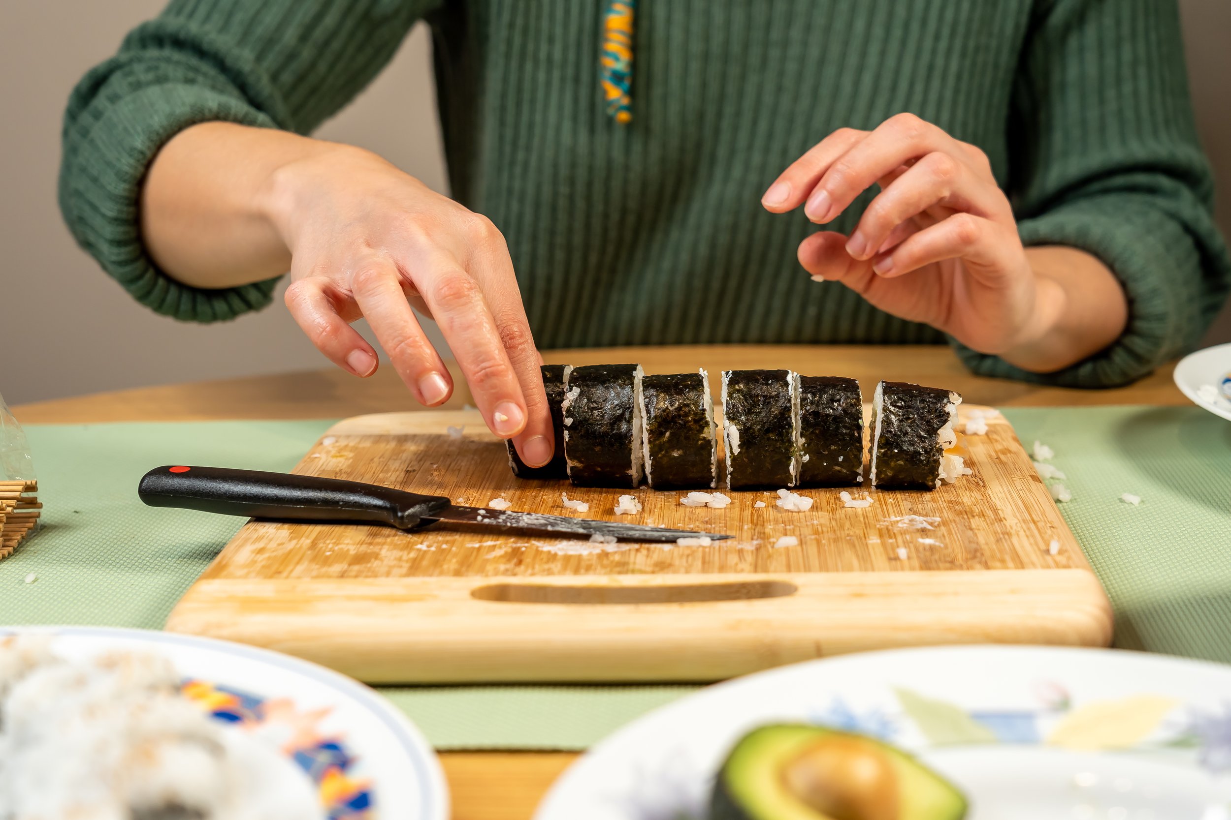 person-making-delicious-homemade-sushi-in-the-kitc-2025-02-11-17-58-42-utc.jpeg