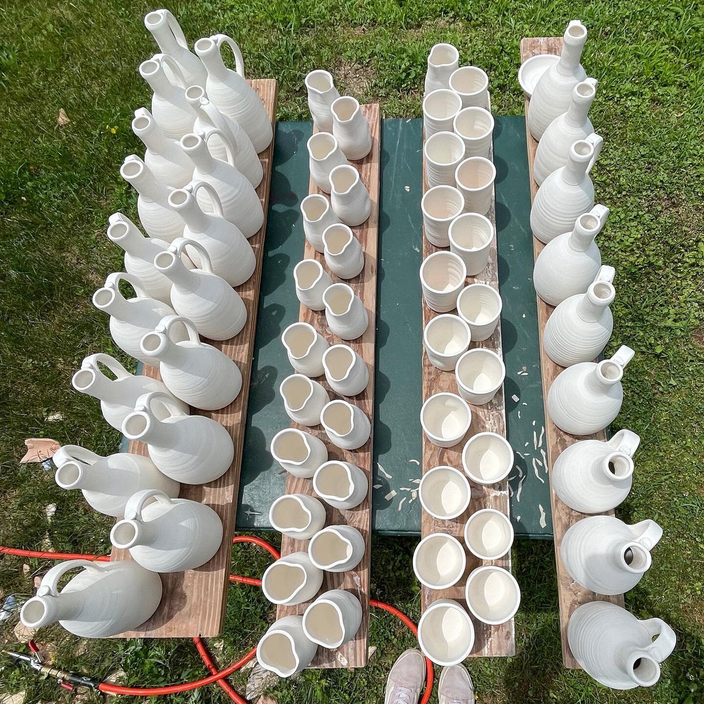 Marks secret touch? ....

The air compressor gun!

As the pots go through their first firing, the water evaporates as the kiln heats up, this leaves the pieces dusty. In order for the next process to start, Mark dunks them in water and after they dry