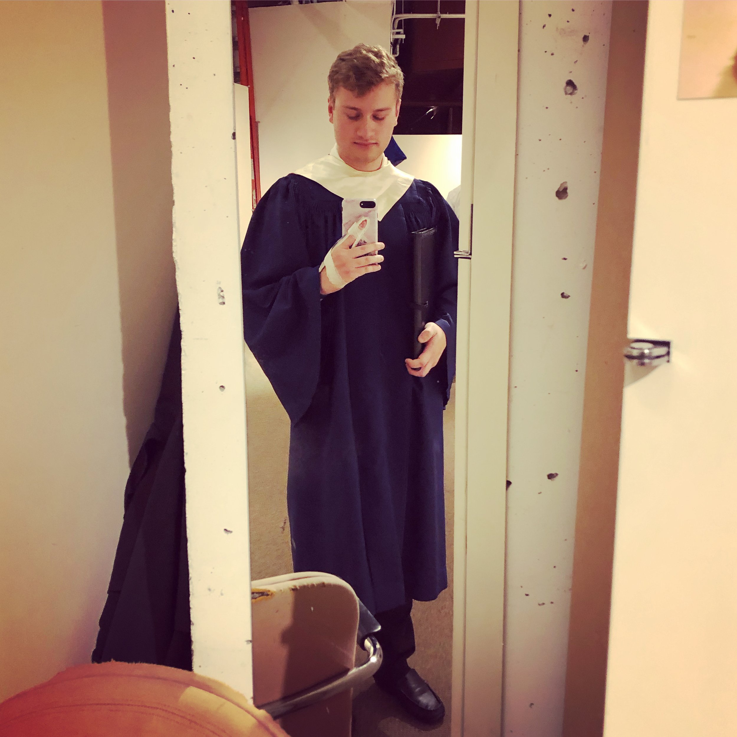 Parker MacIver Hinnenkamp backstage in the Meyerson Symphony Hall in Dallas, Texas before a mass choir performance with members of the Church Music Institute.