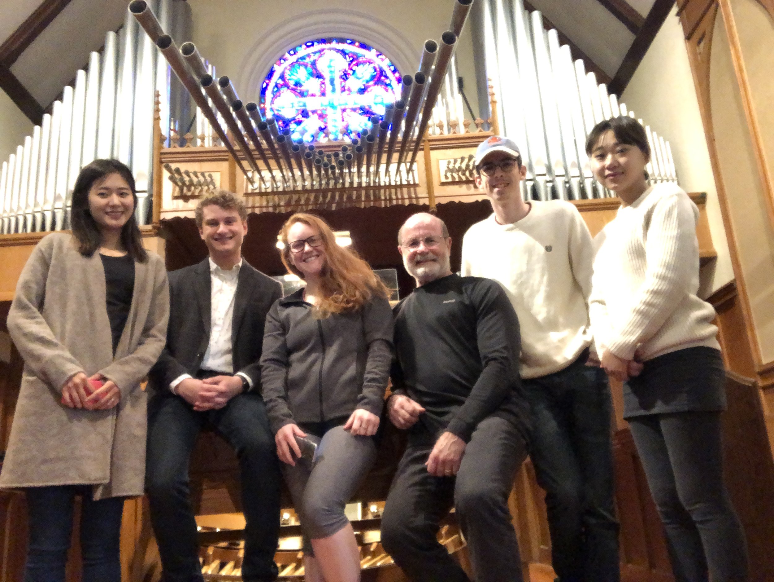 Parker MacIver Hinnenkamp and students of UNT's sacred music studio attend a hymn playing lesson from Tom Froehlich on the Casavant organ in St. Andrew Presbyterian Church.