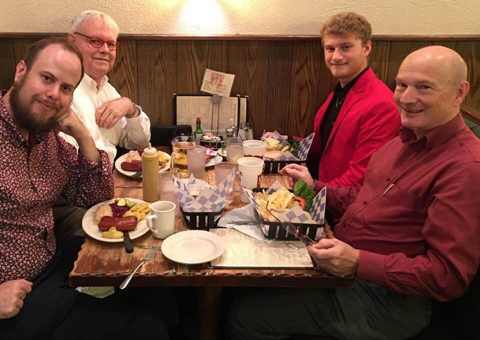 Parker MacIver Hinnenkamp with Graham Schultz, Scott Cantrell, and Jesse Eschbach following a Pentecost service.