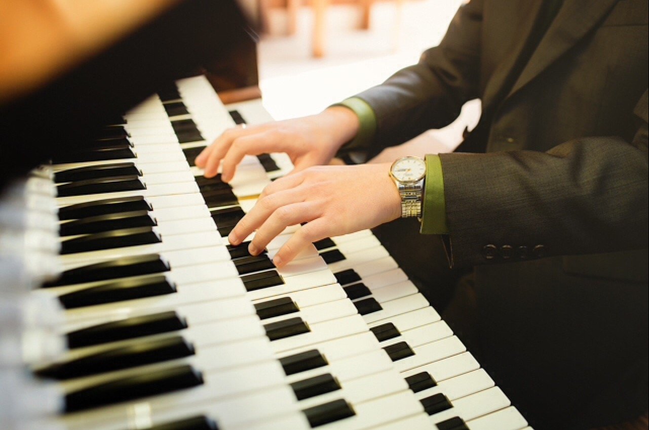 Parker MacIver Hinnenkamp plays the Austin organ in First United Methodist Church.
