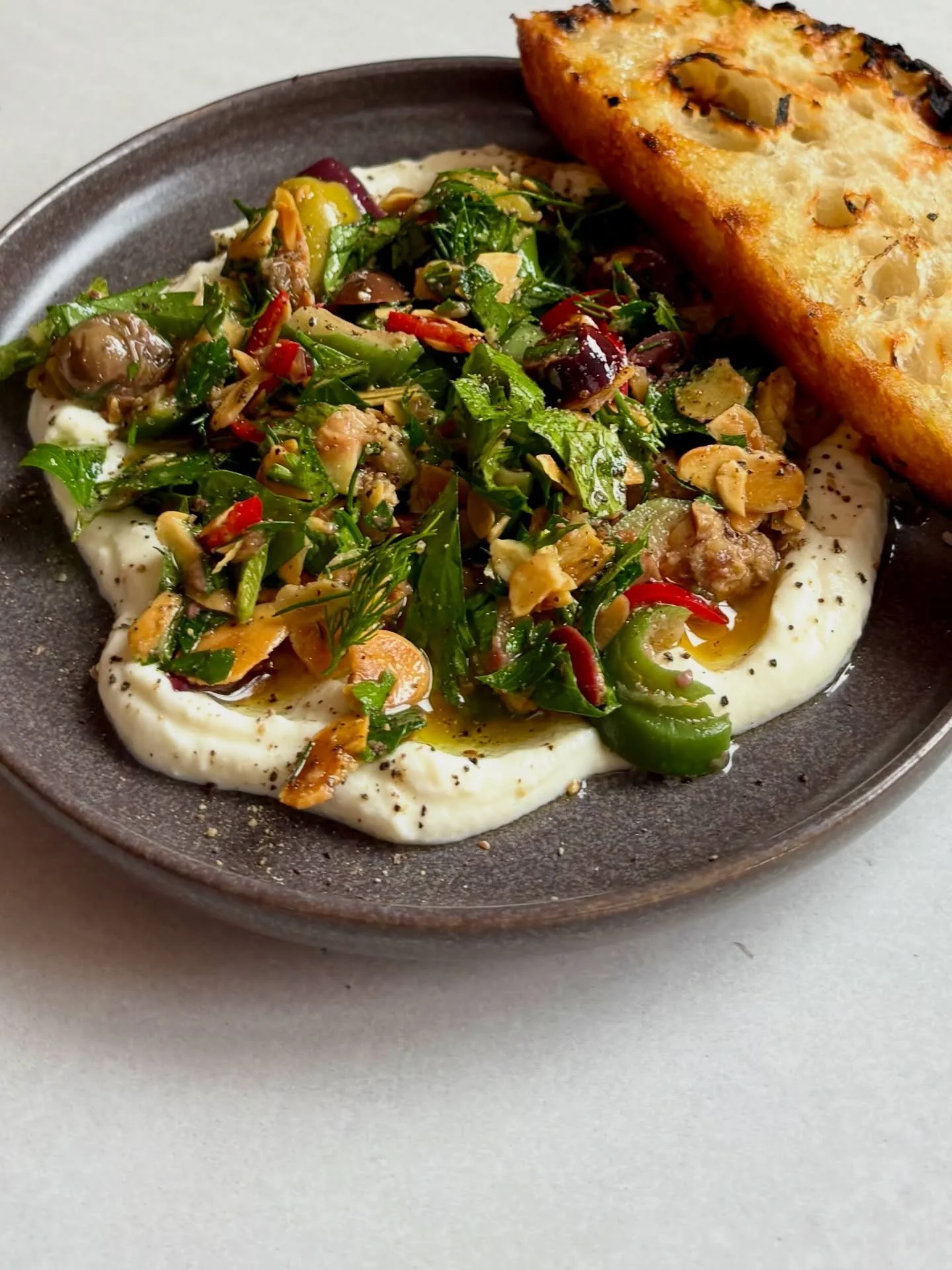 Whipped labne, Sicilian olives, focaccia. Just arrived on the $12 Happy Hour snack menu for this week.