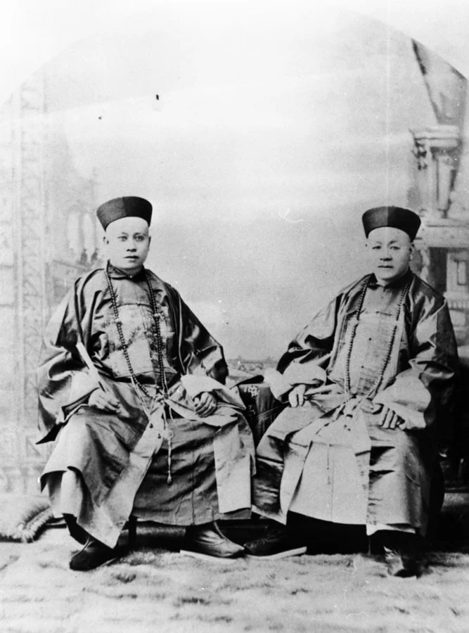 Photograph of Sum Chick Tong with his son Shum Chick Tong, prior to his son returning to China for study. c.1886.