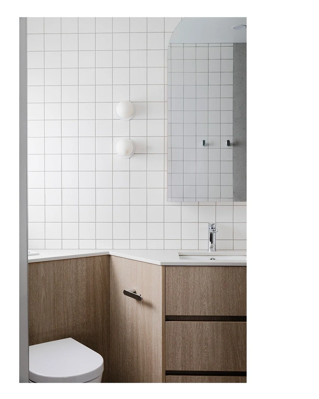 KEILOR HOUSE

The master ensuite layout challenged our client's initial notions of how making spaces work harder led to the reuse of existing services, creation of new storage and incorporating modern amenity into a very compact space.

Photography: 