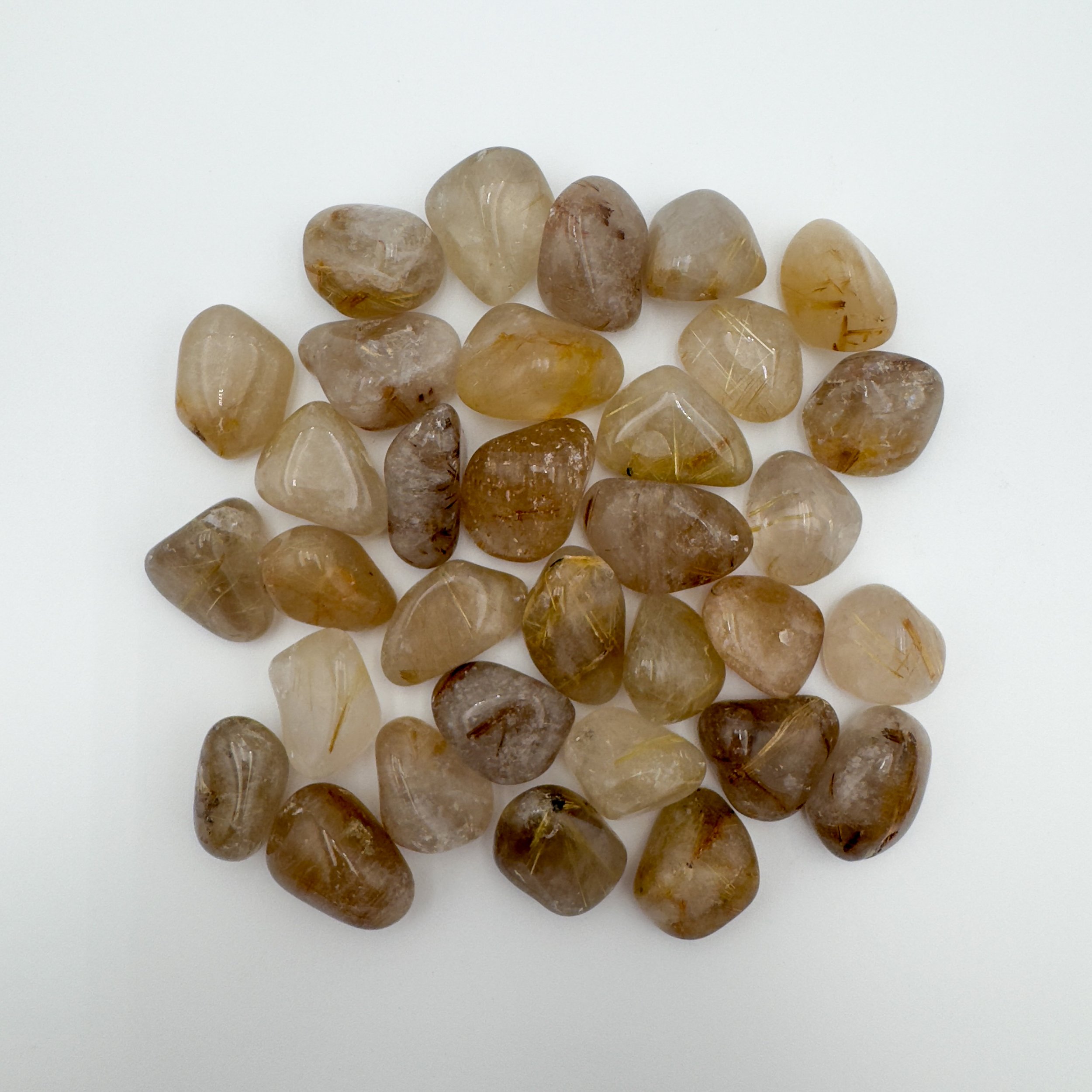 Rutilated Golden Quartz Tumbled Stones (1-1.50 Inch - AA Grade - 24-40 Pieces Per Pound) Ethically Sourced from Brazil - Beyond Bohemian
