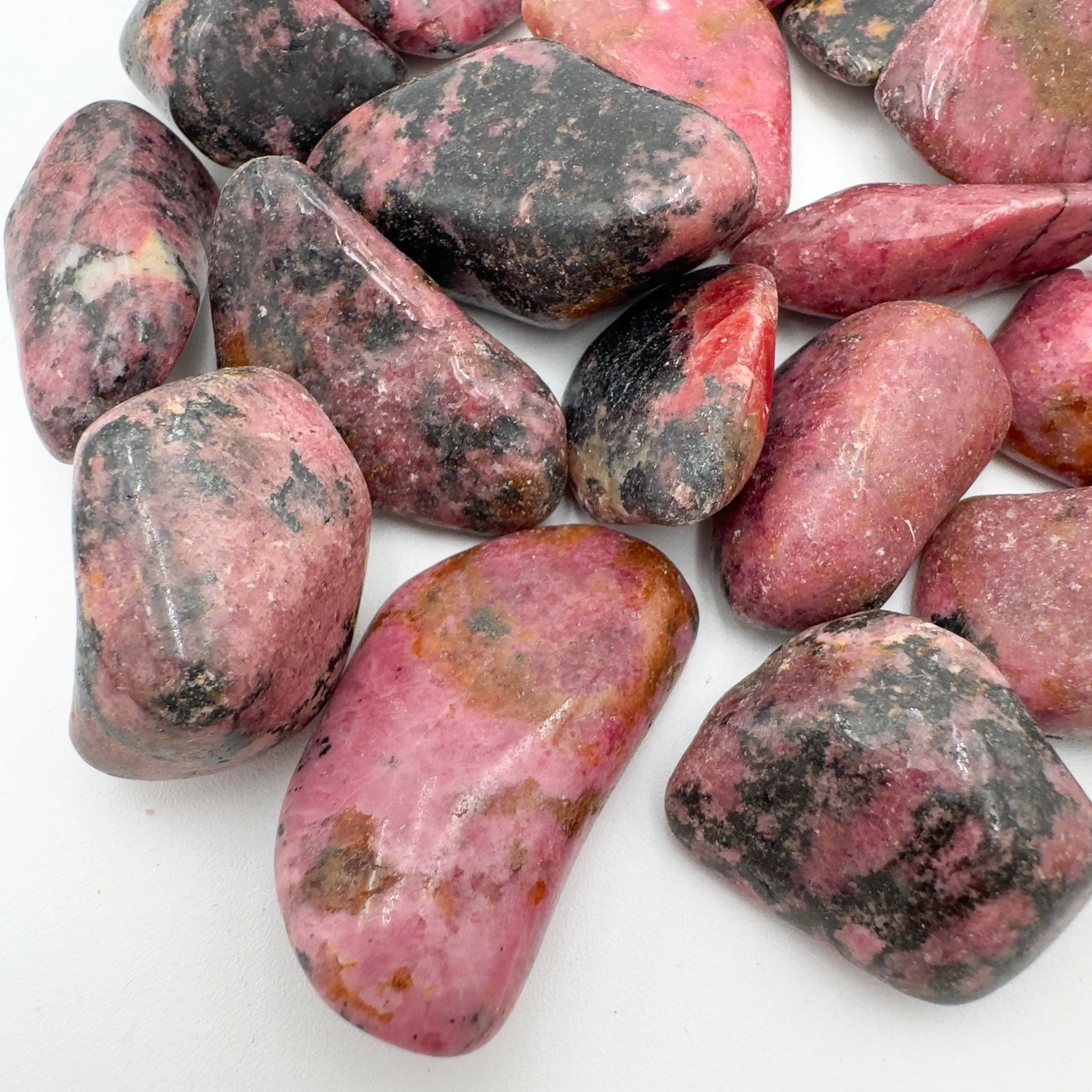 Rhodonite Tumbled Stones (1-1.50 Inch - AA Grade - 16-24 Pieces Per Pound) Ethically Sourced from Zimbabwe - Beyond Bohemian