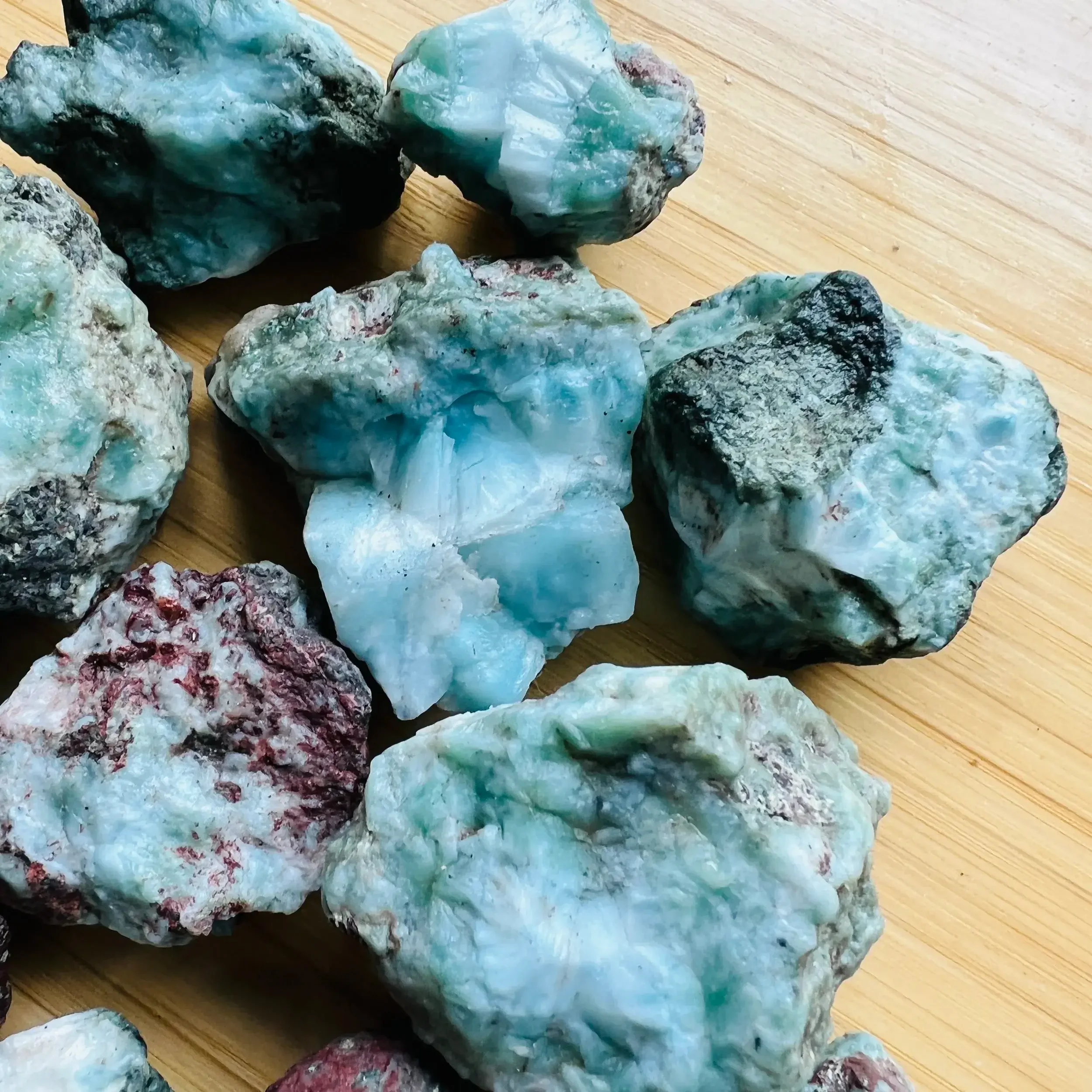 Natural larimar raw stones from the Dominican Republic for grids, healing, and jewelry