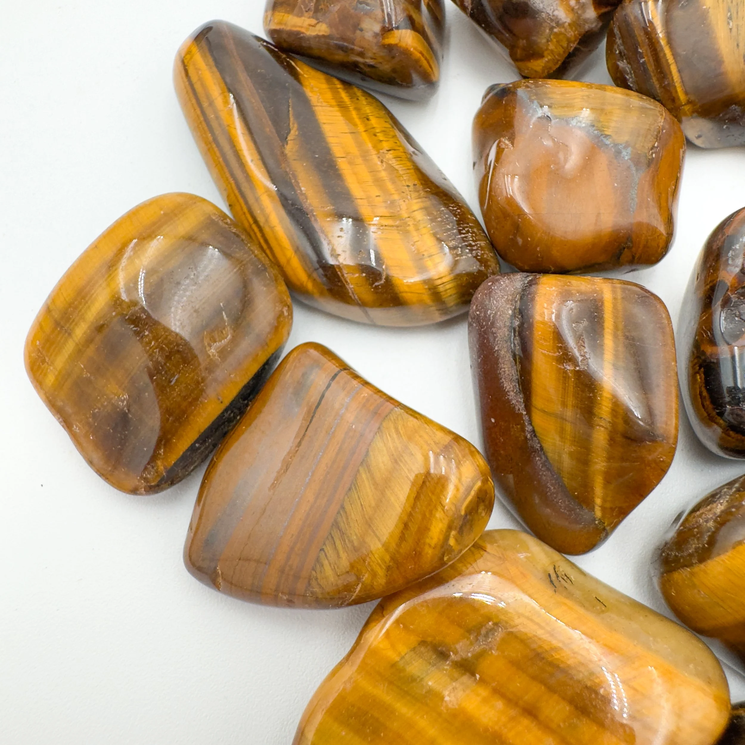 Tiger Eye Tumbled Stones (1.25-2 Inch - A Grade - 16-24 Pieces Per Pound) Ethically Sourced from South Africa - Beyond Bohemian
