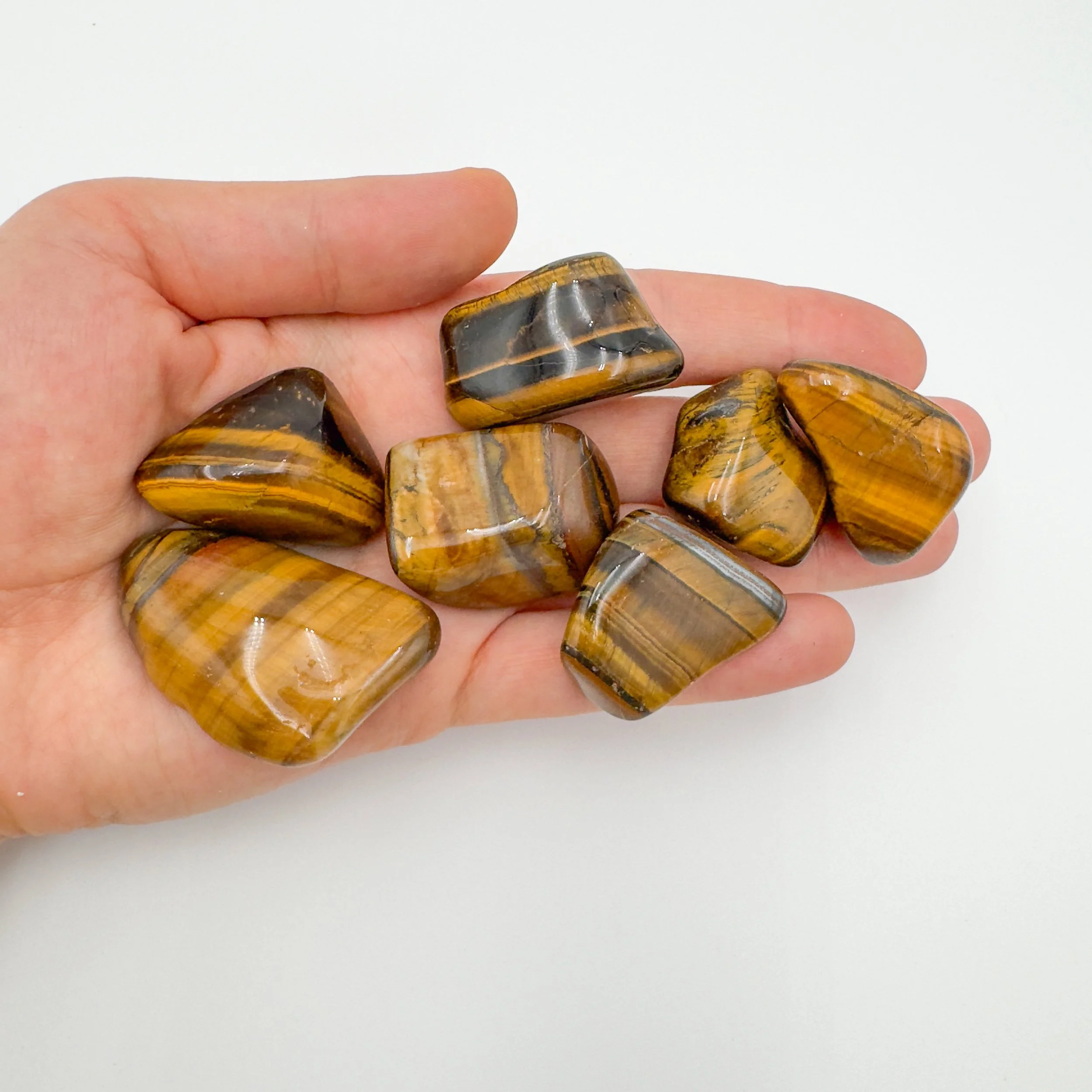 Tiger Eye Tumbled Stones (1.25-2 Inch - A Grade - 16-24 Pieces Per Pound) Ethically Sourced from South Africa - Beyond Bohemian