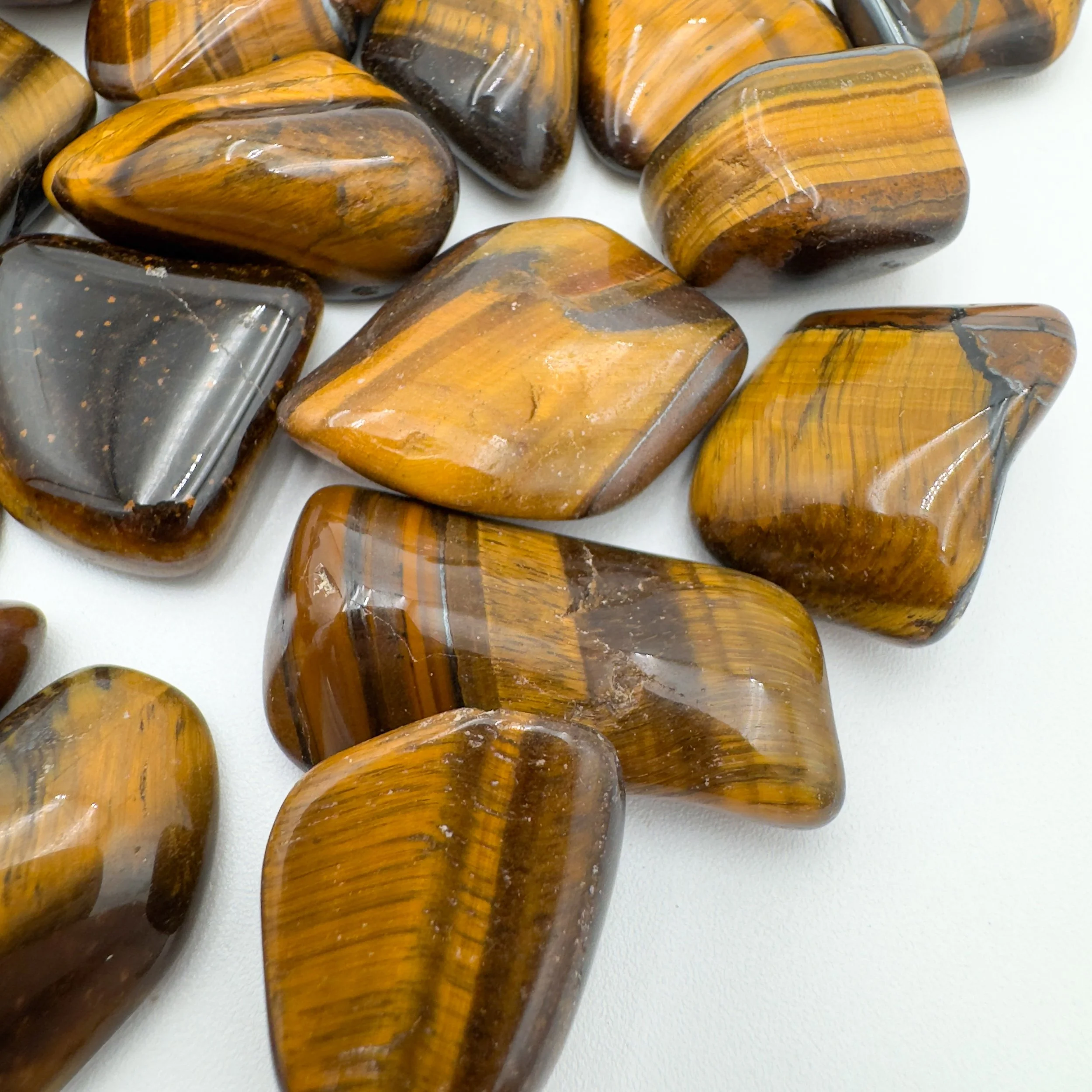 Wholesale Tiger Eye Tumbled Stones 7889.jpg