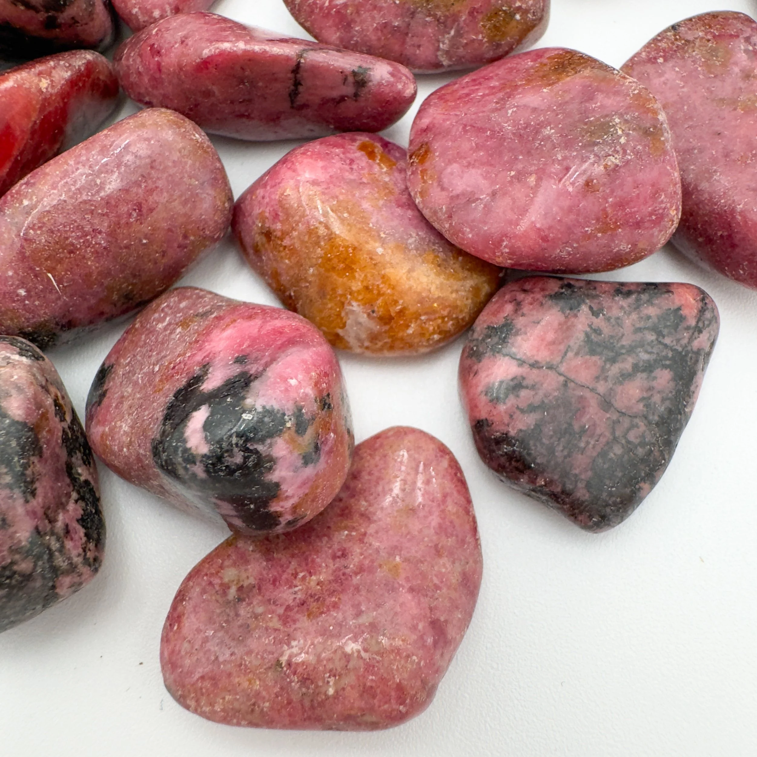 Rhodonite Tumbled Stones (1-1.50 Inch - AA Grade - 16-24 Pieces Per Pound) Ethically Sourced from Zimbabwe - Beyond Bohemian