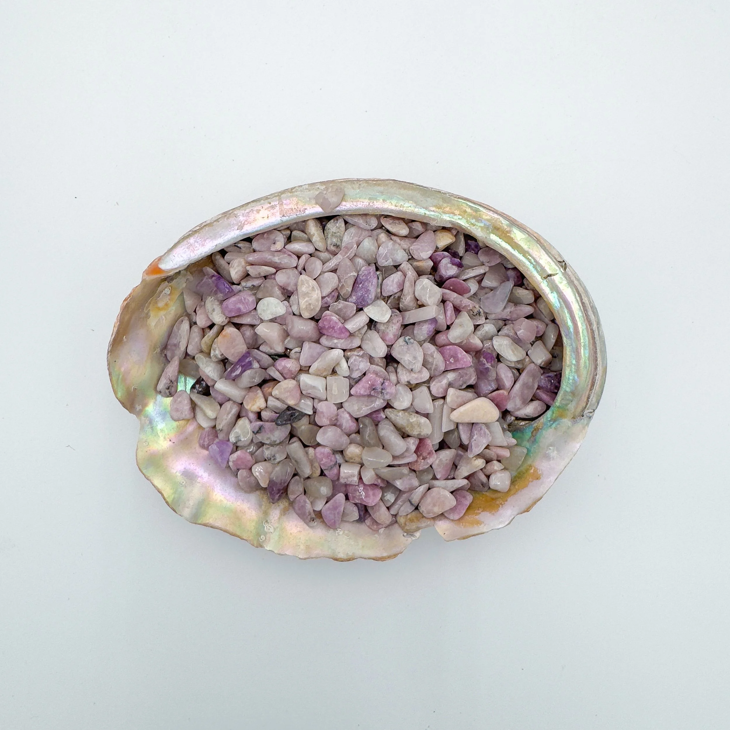 Bulk Lepidolite crystal chips – polished tumbled purple gemstone pieces with mica sparkle, ideal for crafts, décor, jewelry making, and healing work.