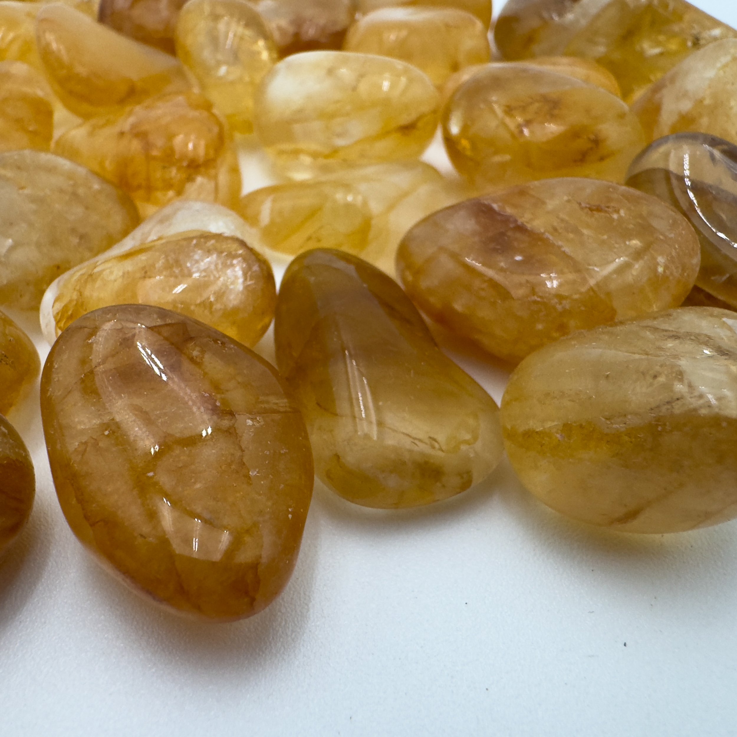 Bulk Tumbled Golden Healer Quartz Crystals5501.jpg