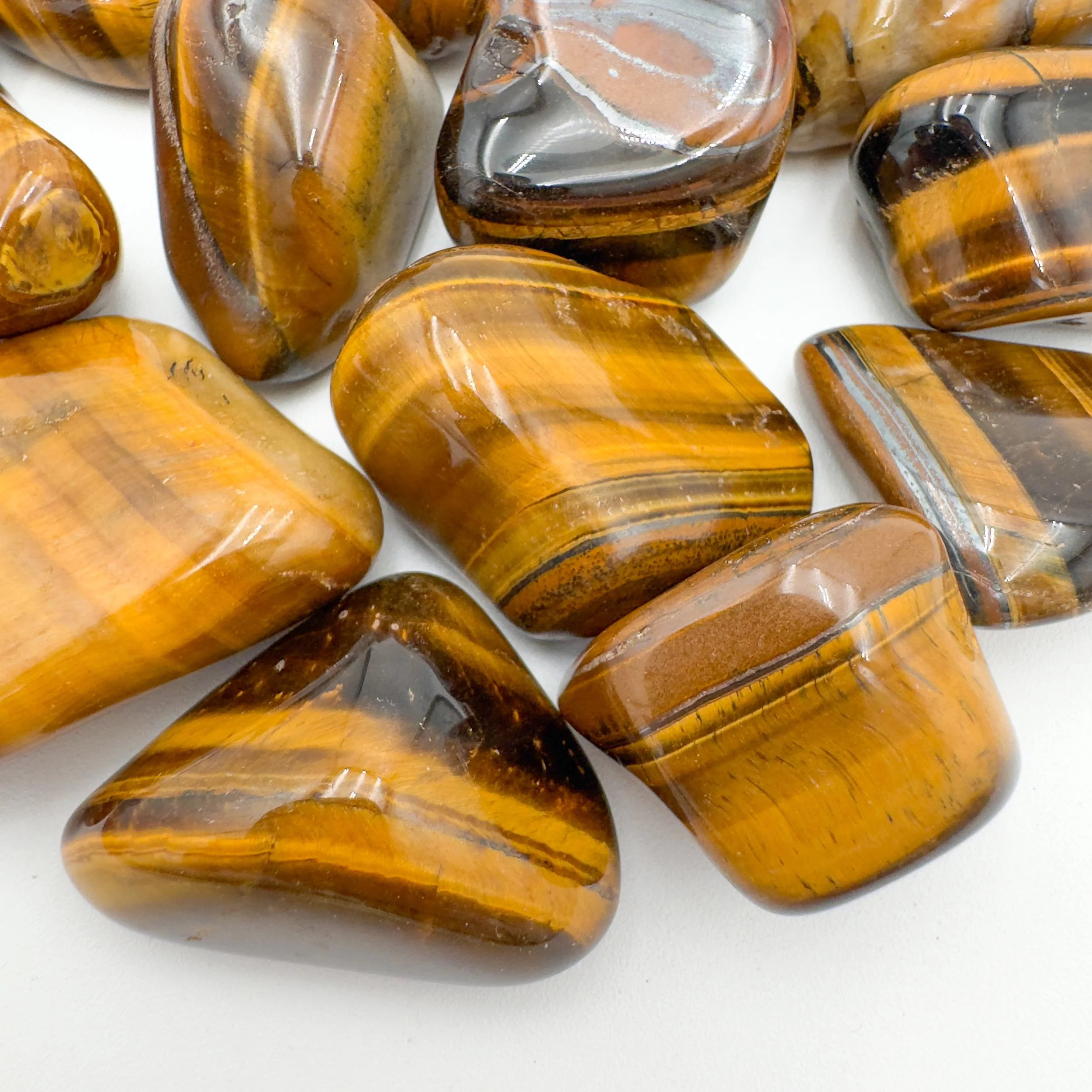 Tiger Eye Tumbled Stones (1.25-2 Inch - A Grade - 16-24 Pieces Per Pound) Ethically Sourced from South Africa - Beyond Bohemian