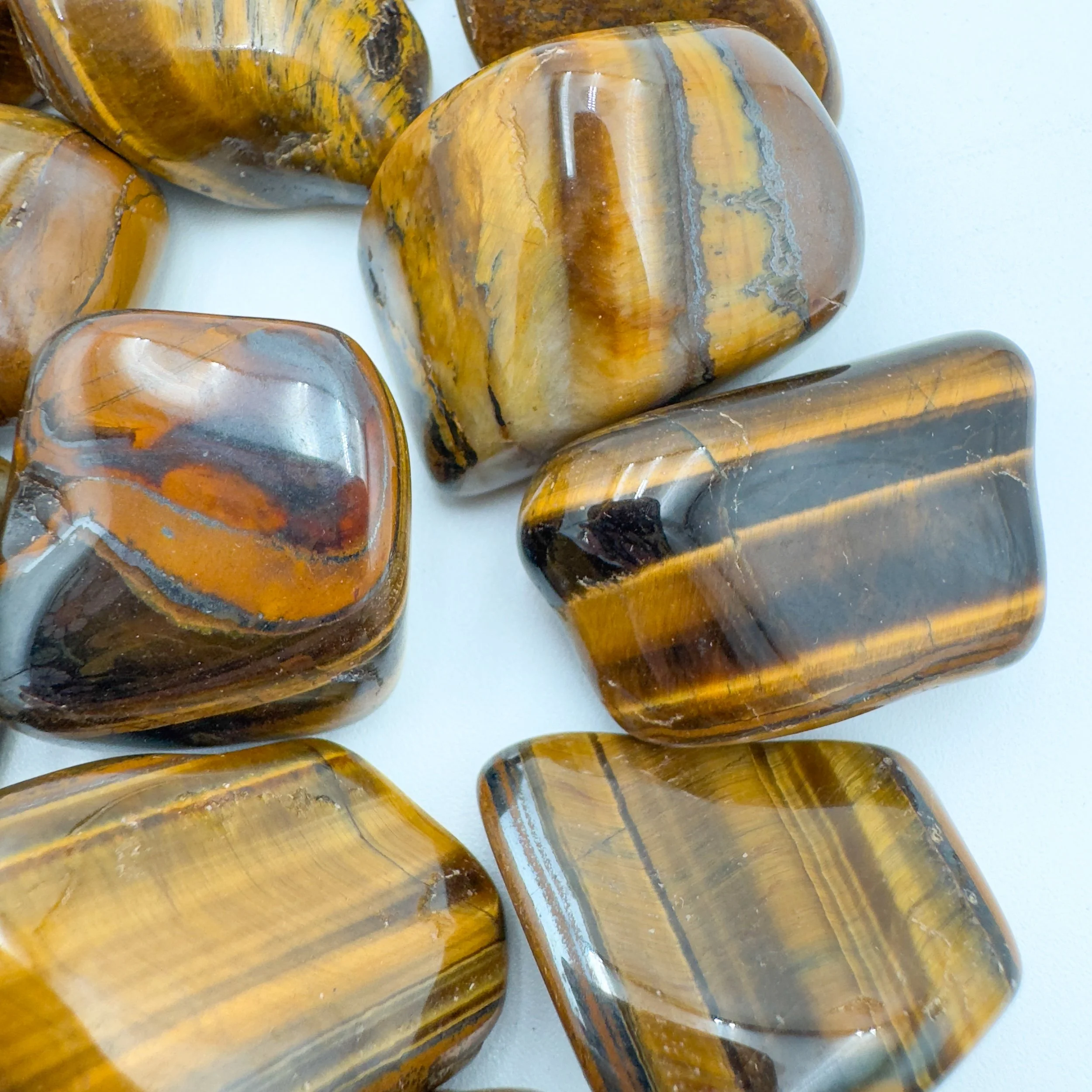 Tiger Eye Tumbled Stones (1.25-2 Inch - A Grade - 16-24 Pieces Per Pound) Ethically Sourced from South Africa - Beyond Bohemian