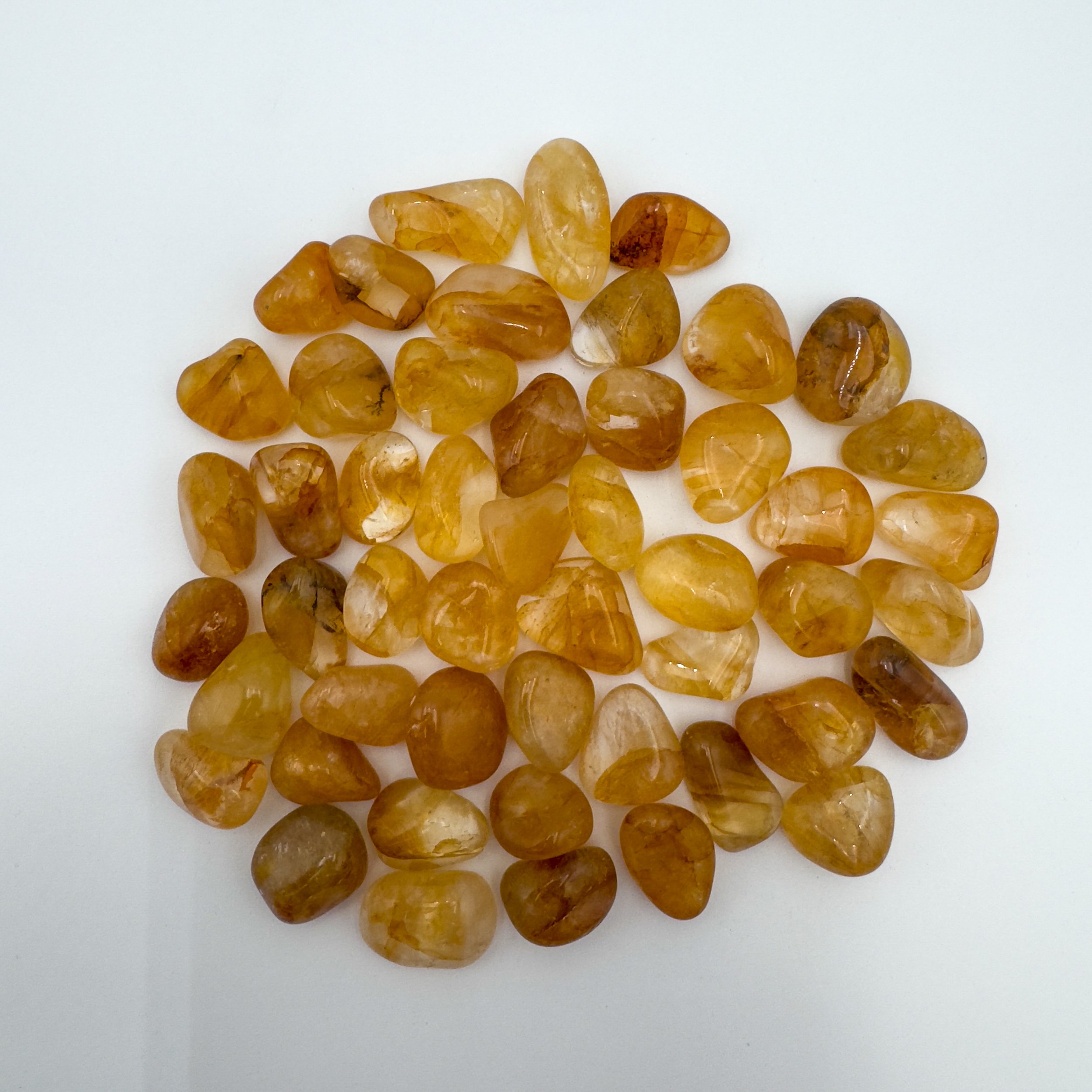 Bulk Tumbled Golden Healer Quartz Crystals5499.jpg