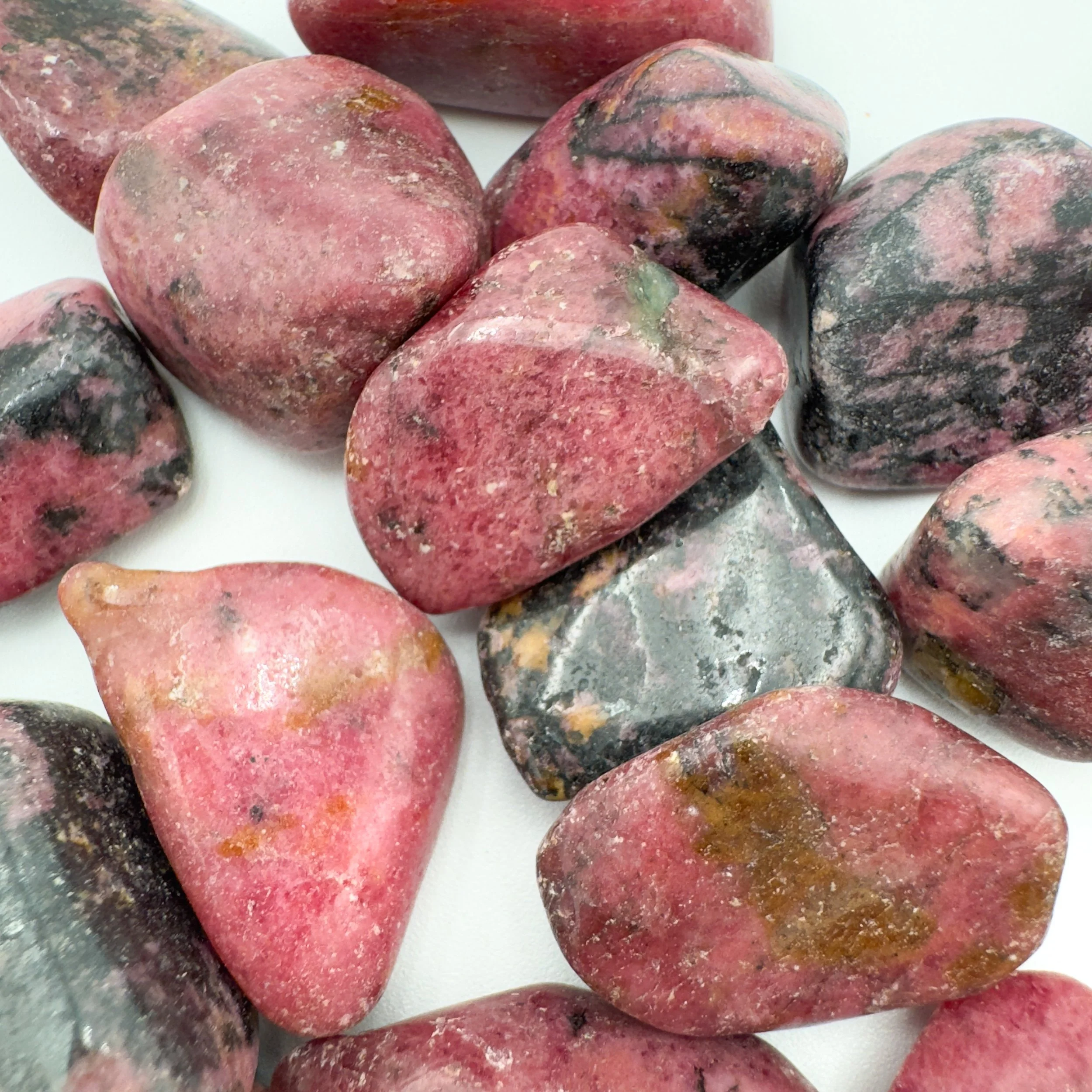 Rhodonite Tumbled Stones (1-1.50 Inch - AA Grade - 16-24 Pieces Per Pound) Ethically Sourced from Zimbabwe - Beyond Bohemian