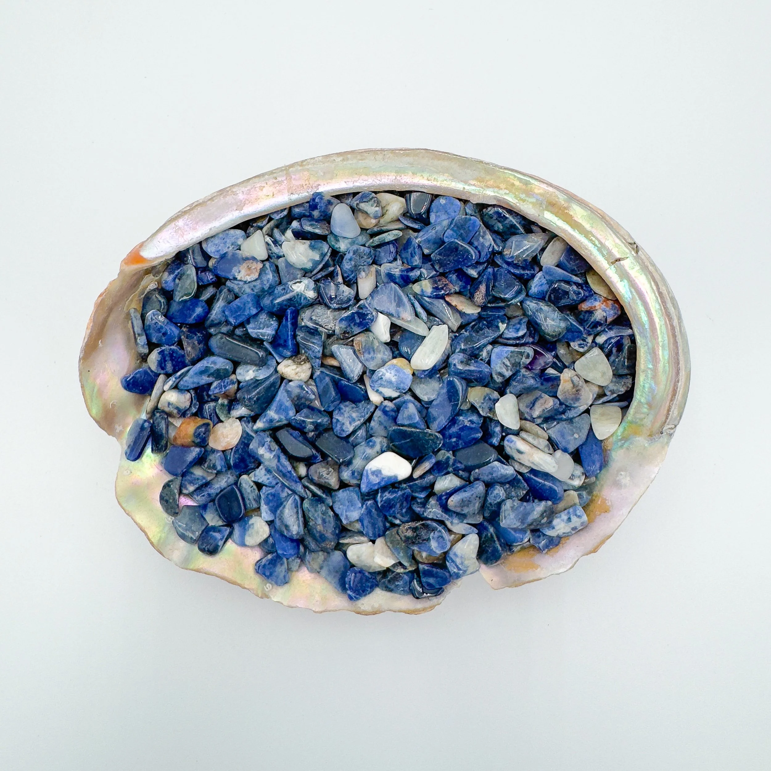 Bulk Sodalite crystal chips – polished tumbled blue and white gemstone pieces for crafts, décor, jewelry making, meditation, and healing energy work.