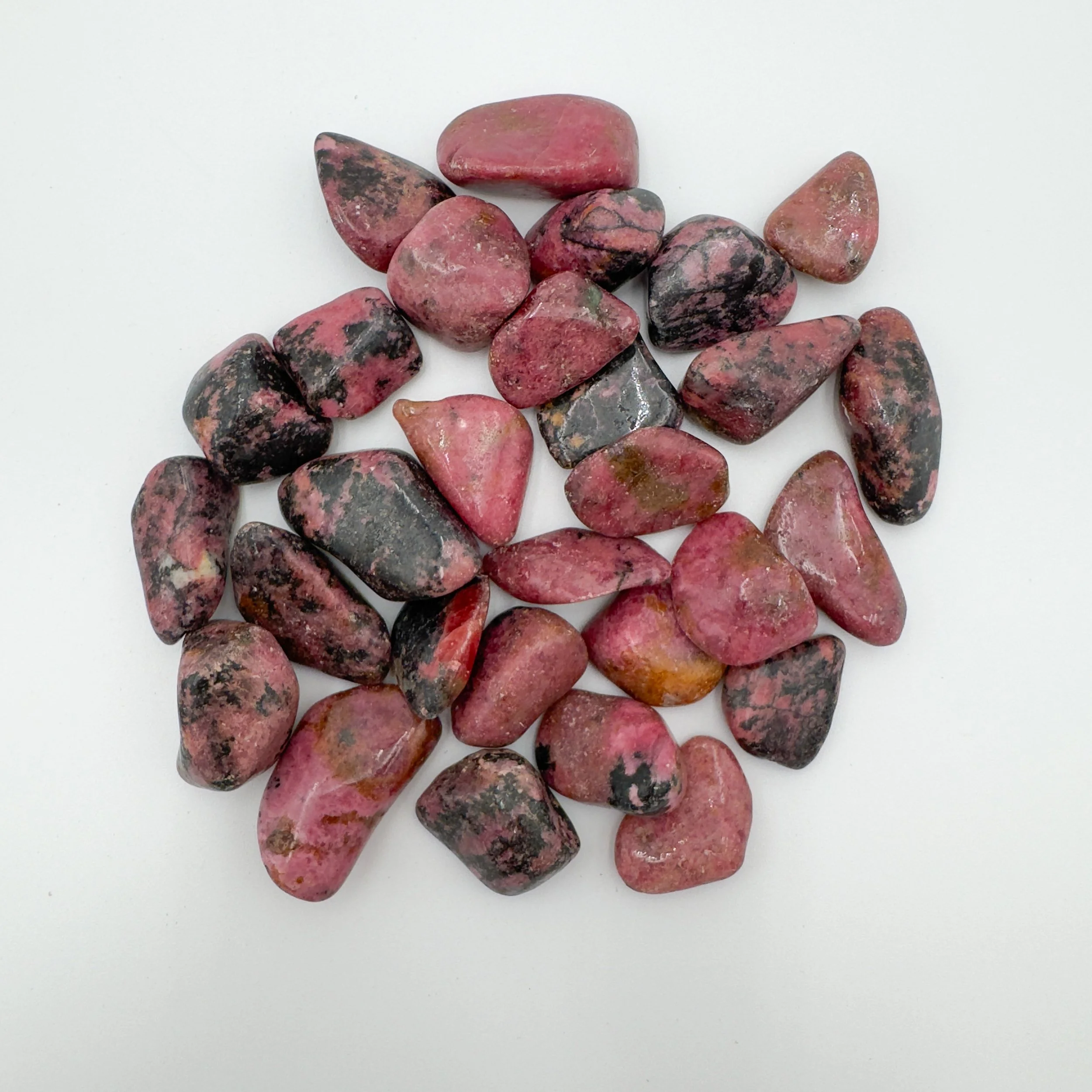 Rhodonite Tumbled Stones (1-1.50 Inch - AA Grade - 16-24 Pieces Per Pound) Ethically Sourced from Zimbabwe - Beyond Bohemian