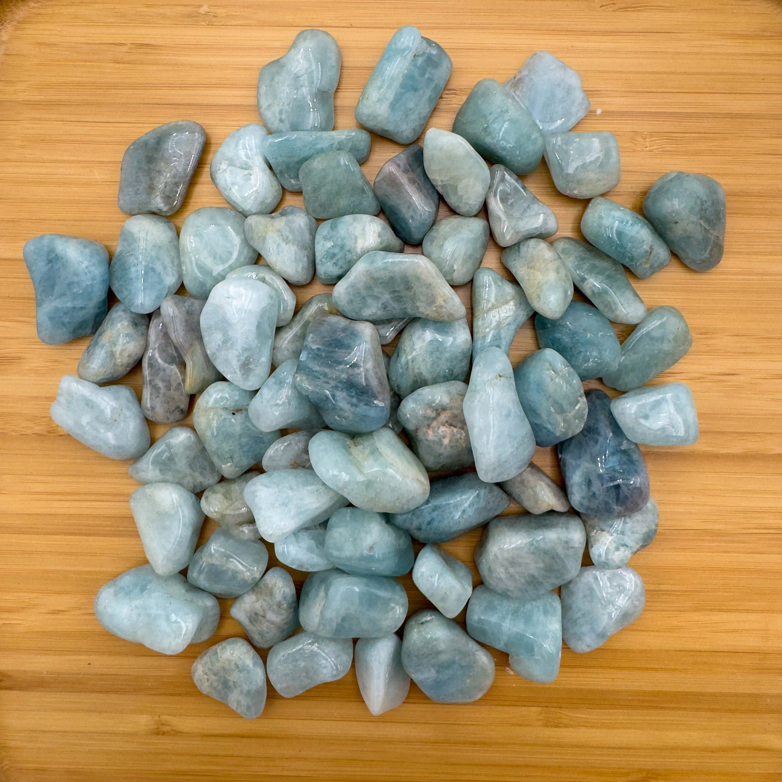 Aquamarine Tumble Stones (0.75-1.25 Inch - A Grade - 40-64 Pieces Per Pound) Ethically Sourced from Brazil - Beyond Bohemian