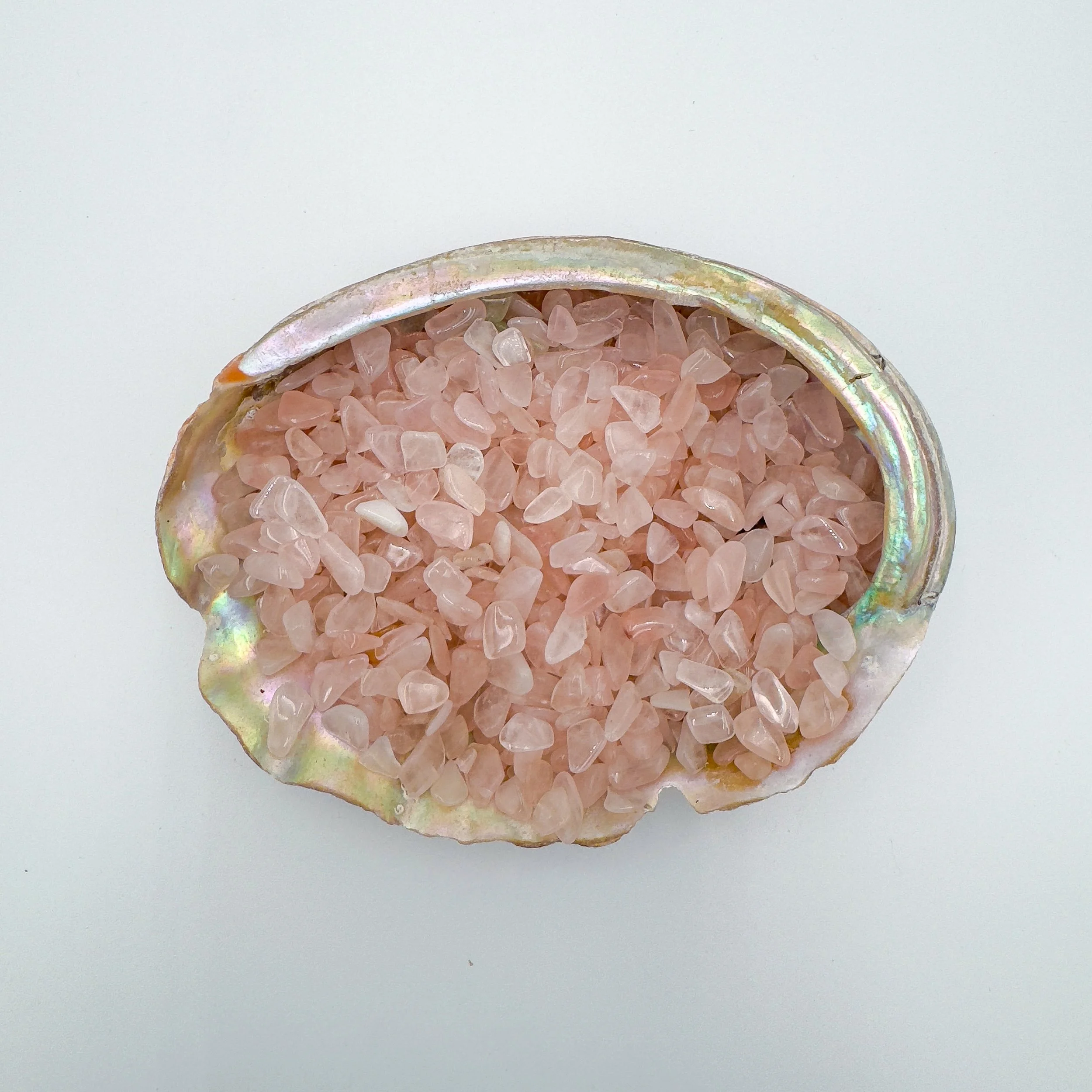 Bulk Rose Quartz crystal chips – polished tumbled light pink gemstone pieces for crafts, décor, jewelry making, meditation, and healing energy work.