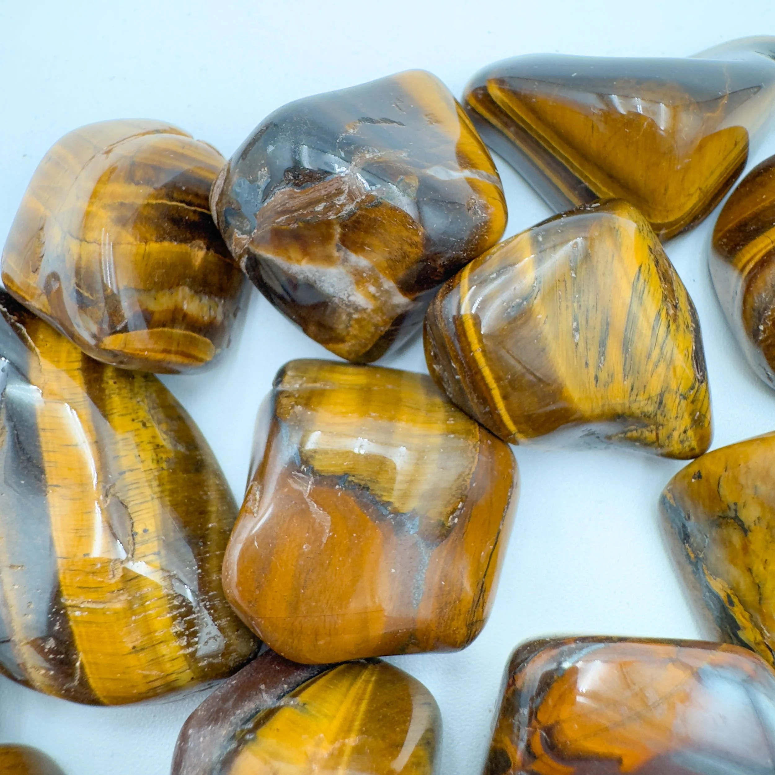 Tiger Eye Tumbled Stones (1.25-2 Inch - A Grade - 16-24 Pieces Per Pound) Ethically Sourced from South Africa - Beyond Bohemian