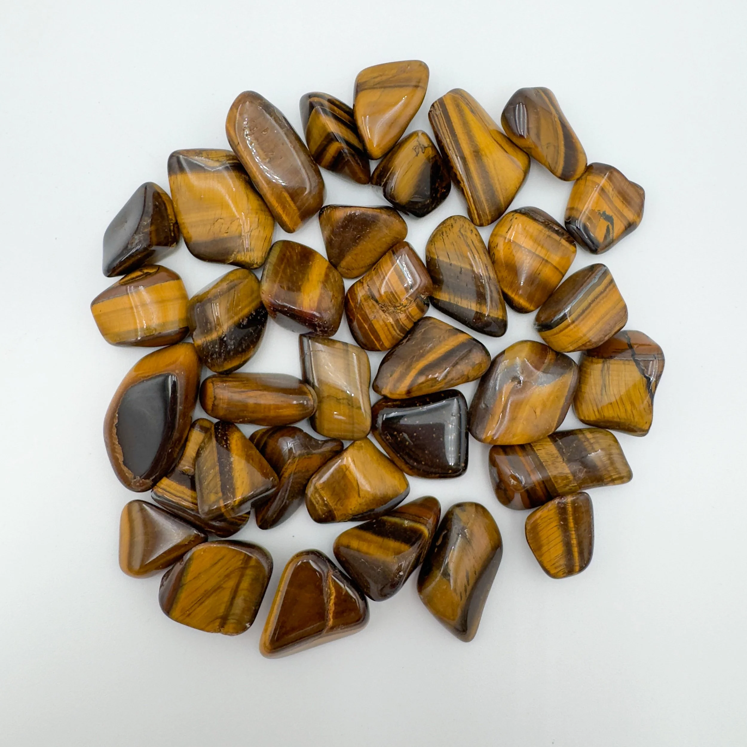 Bulk polished Tiger Eye stones for jewelers and artisans